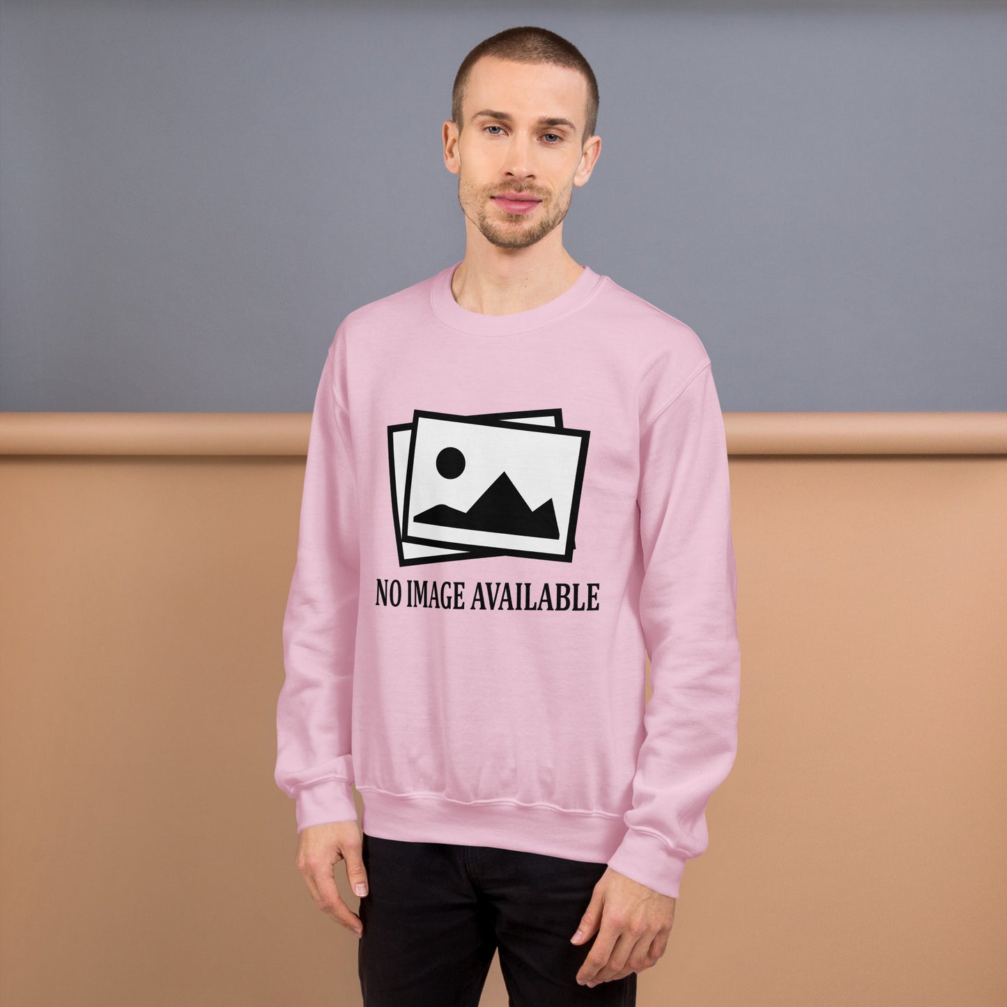 Men with pink sweatshirt with image and text "no image available"