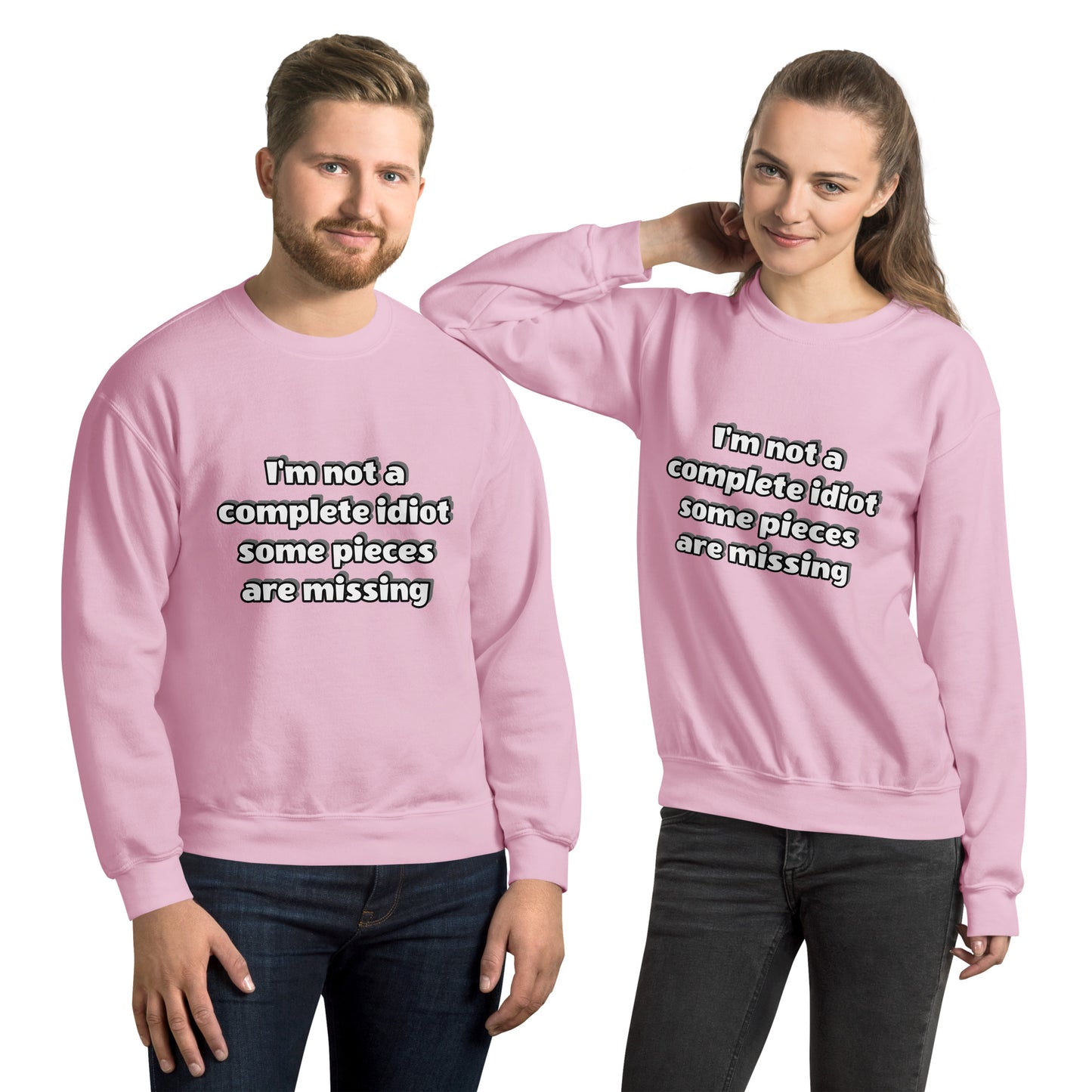 Man and women with pink sweatshirt with text “I’m not a complete idiot, some pieces are missing”