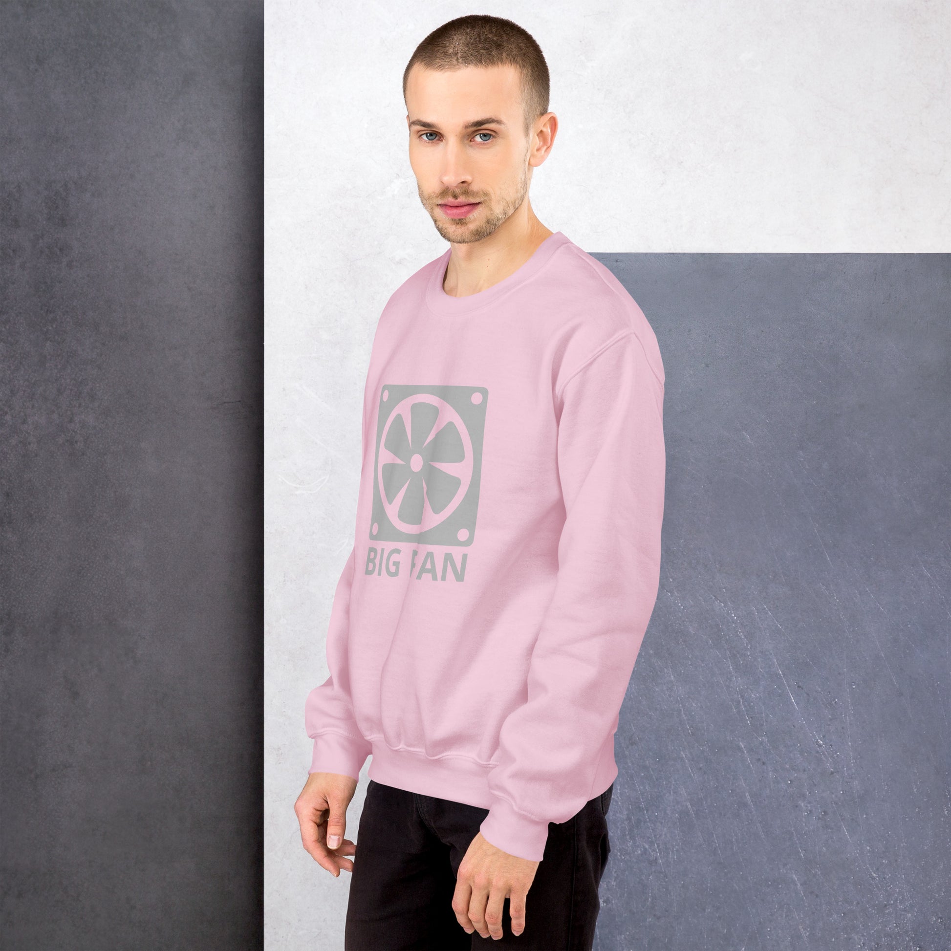 Men with pink sweatshirt with image of a big computer fan and the text "BIG FAN"
