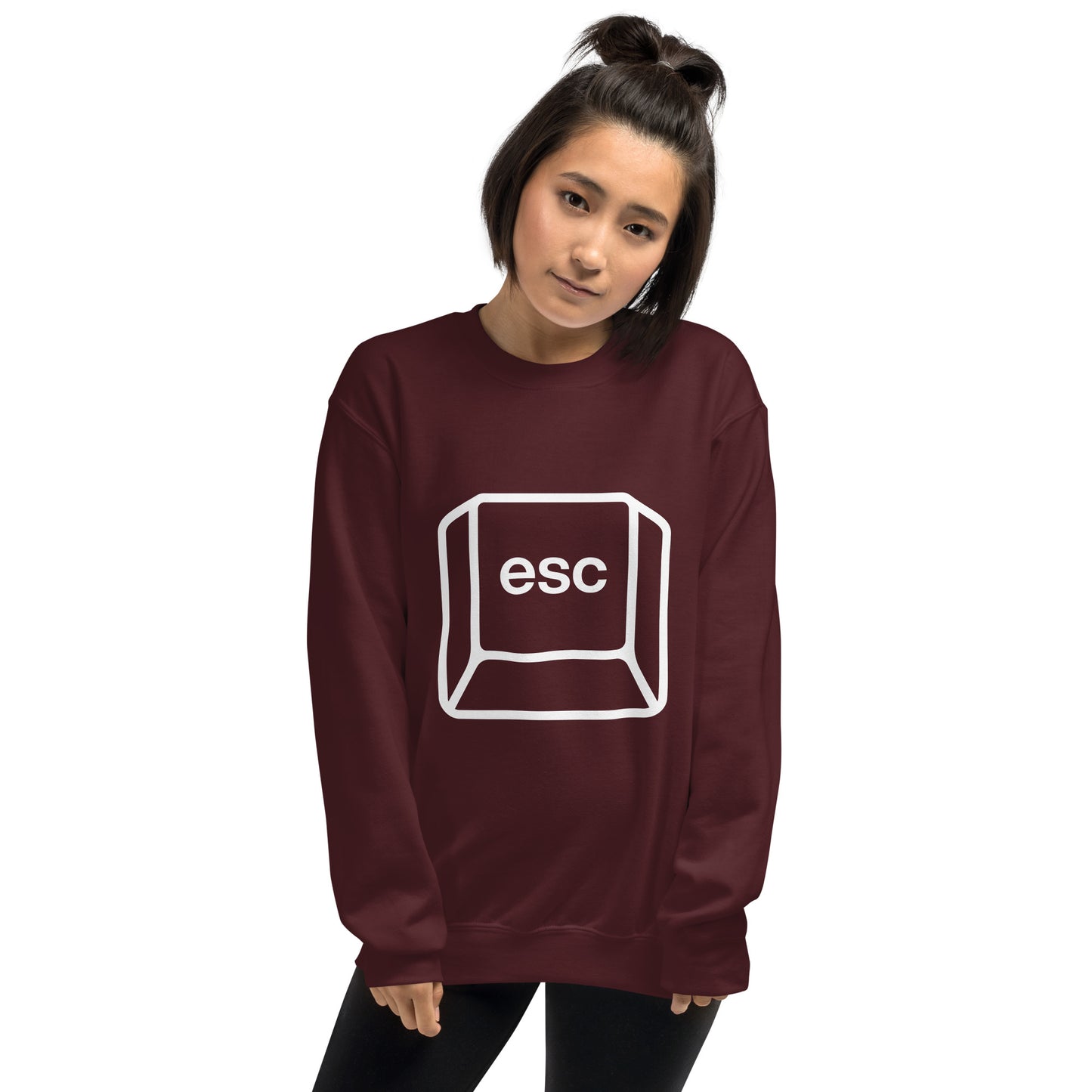 Woman with maroon sweatshirt with picture of esc key