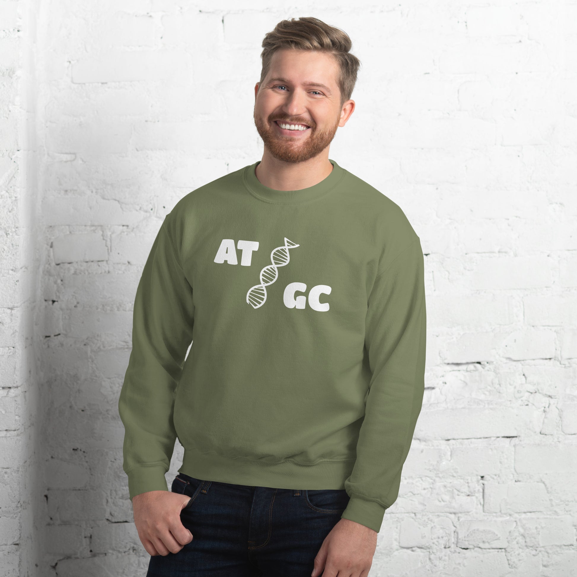 Men with military green sweatshirt with image of a DNA string and the text "ATGC"