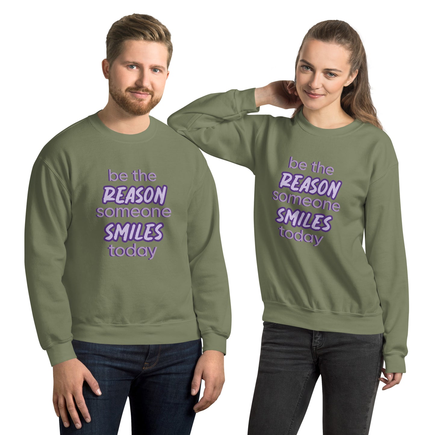 Men and women with military green sweater and the quote "be the reason someone smiles today" in purple on it.