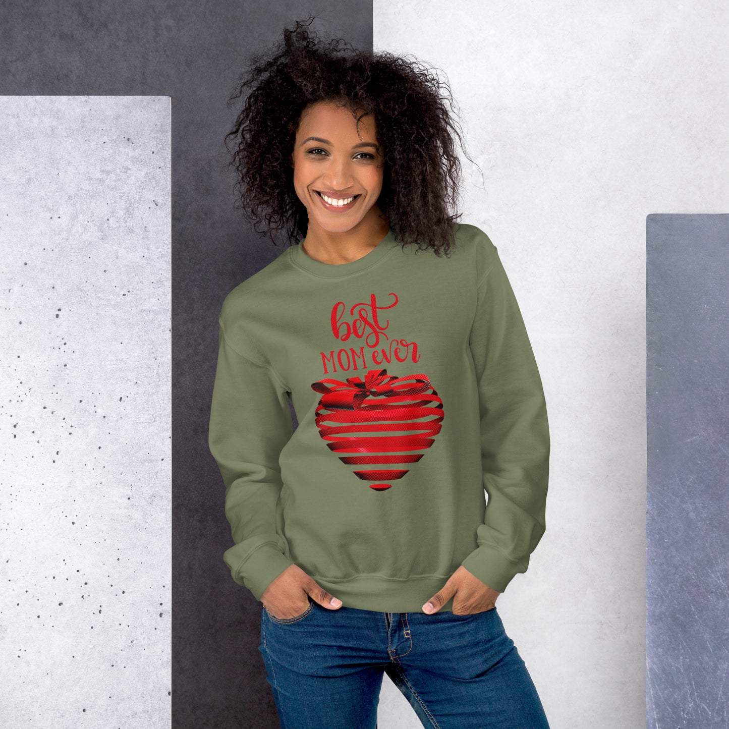 Women with military green sweater with red text best MOM Ever and red heart