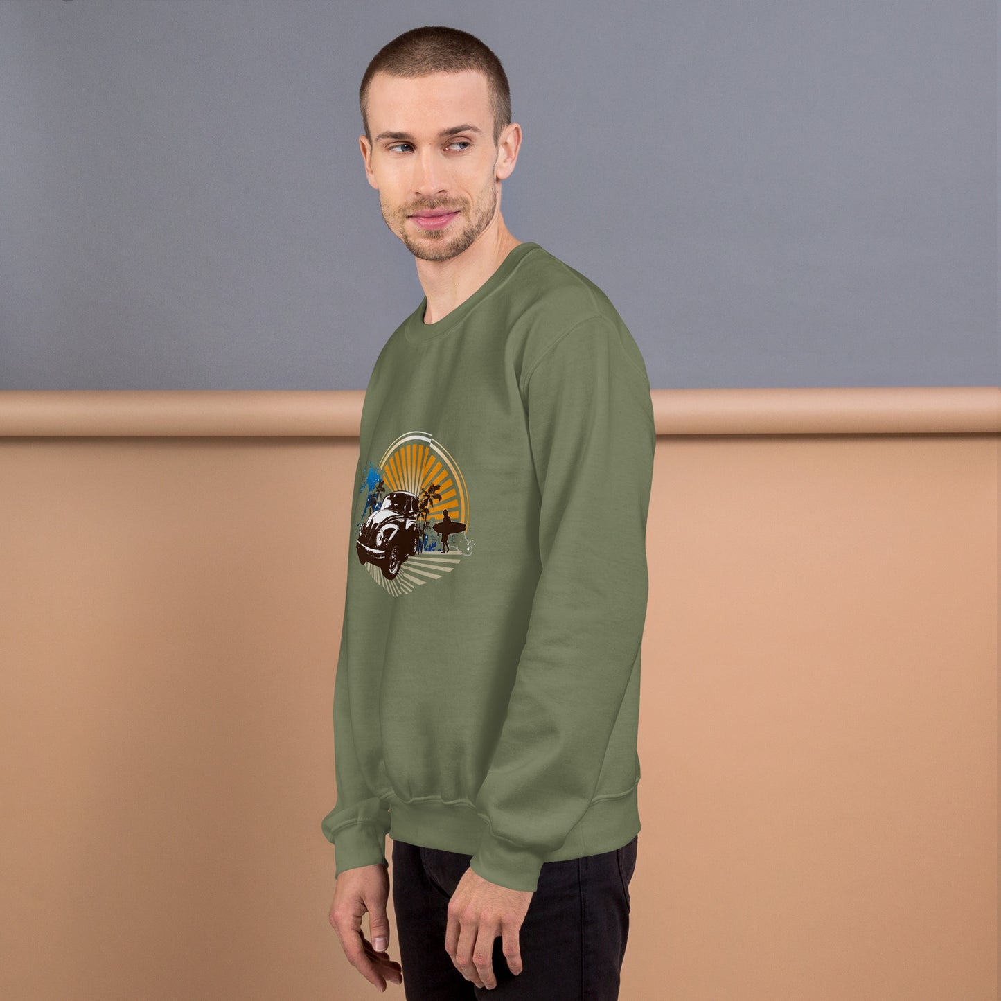 Men with military green sweatshirt with sunset and beetle car