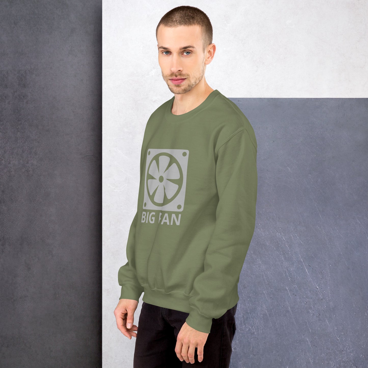 Men with military green sweatshirt with image of a big computer fan and the text "BIG FAN"