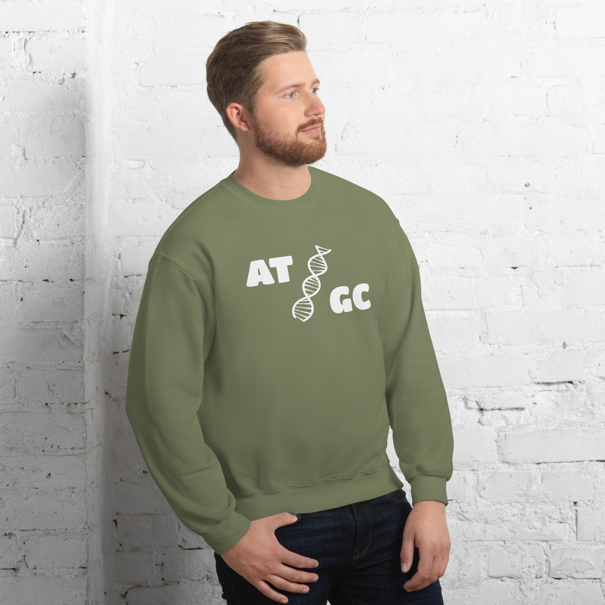 Men with military green sweatshirt with image of a DNA string and the text "ATGC"