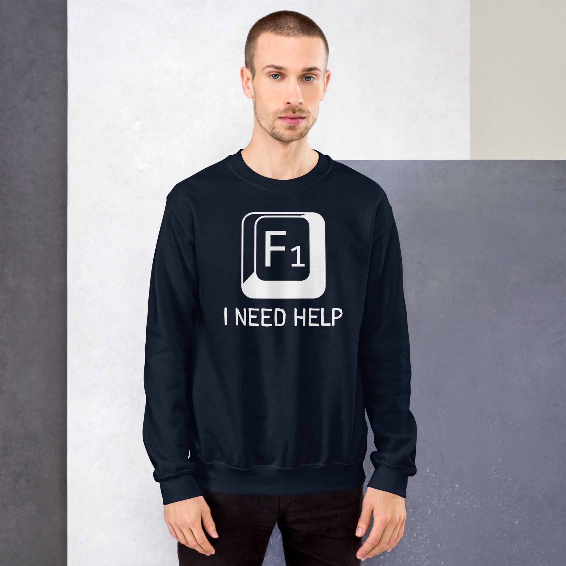 Men with navy sweatshirt and a picture of F1 key with text "I need help"