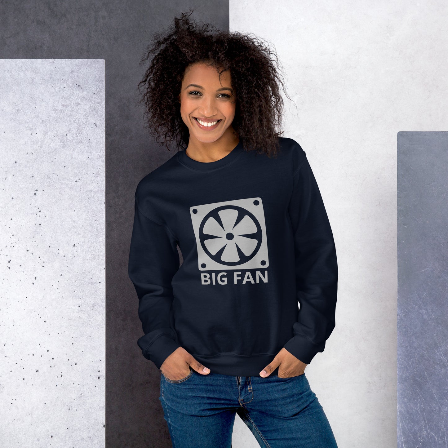 Women with navy blue sweatshirt with image of a big computer fan and the text "BIG FAN"