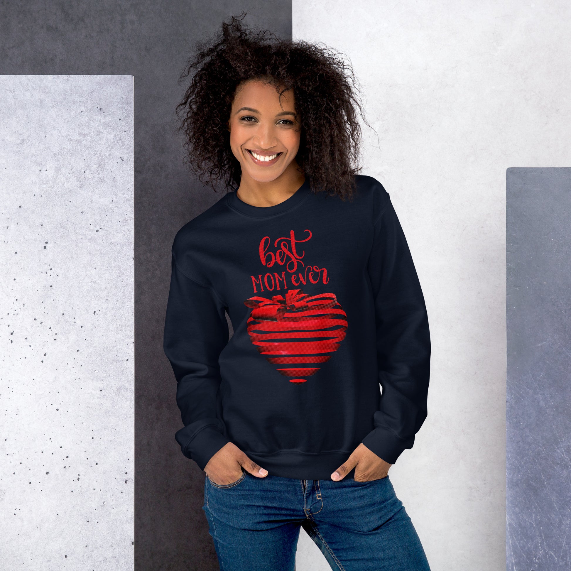 Women with navy sweater with red text best MOM Ever and red heart