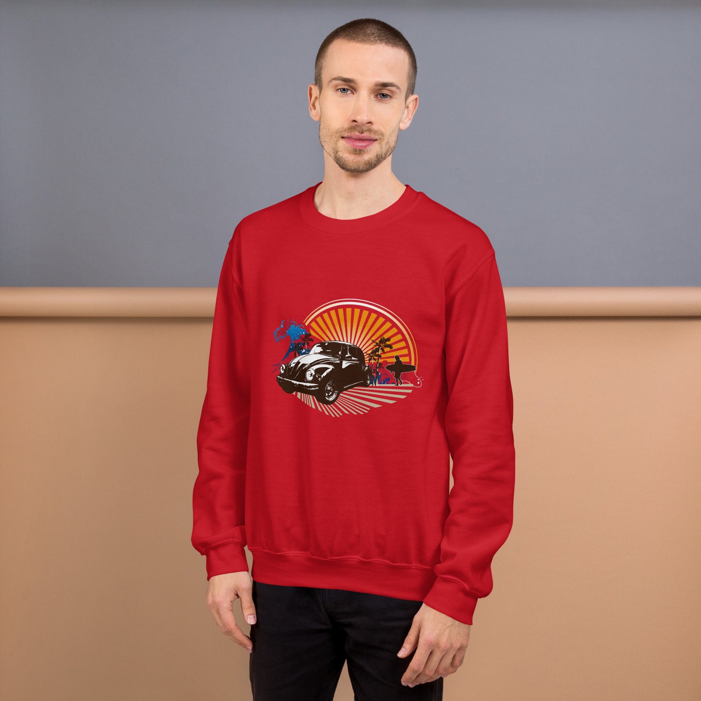 Men with red sweatshirt with sunset and beetle car