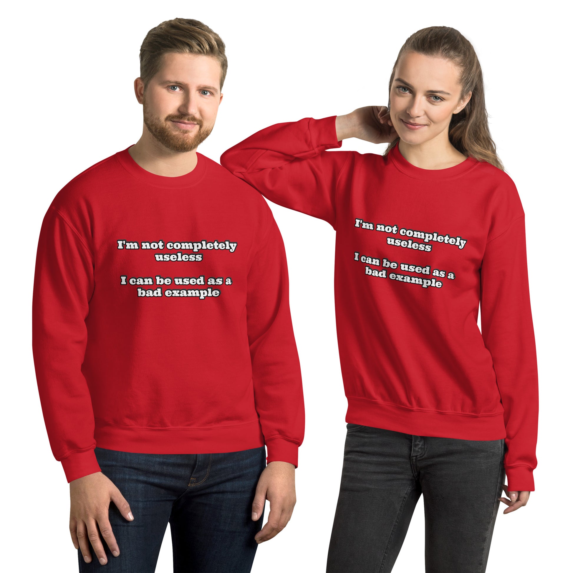 Man and women with red sweatshirt with text “I'm not completely useless I can be used as a bad example”