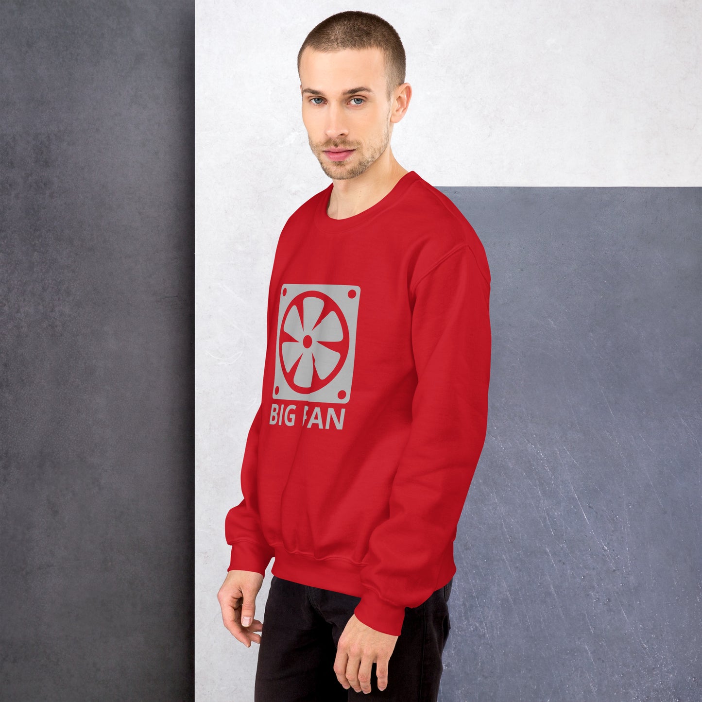 Men with red sweatshirt with image of a big computer fan and the text "BIG FAN"