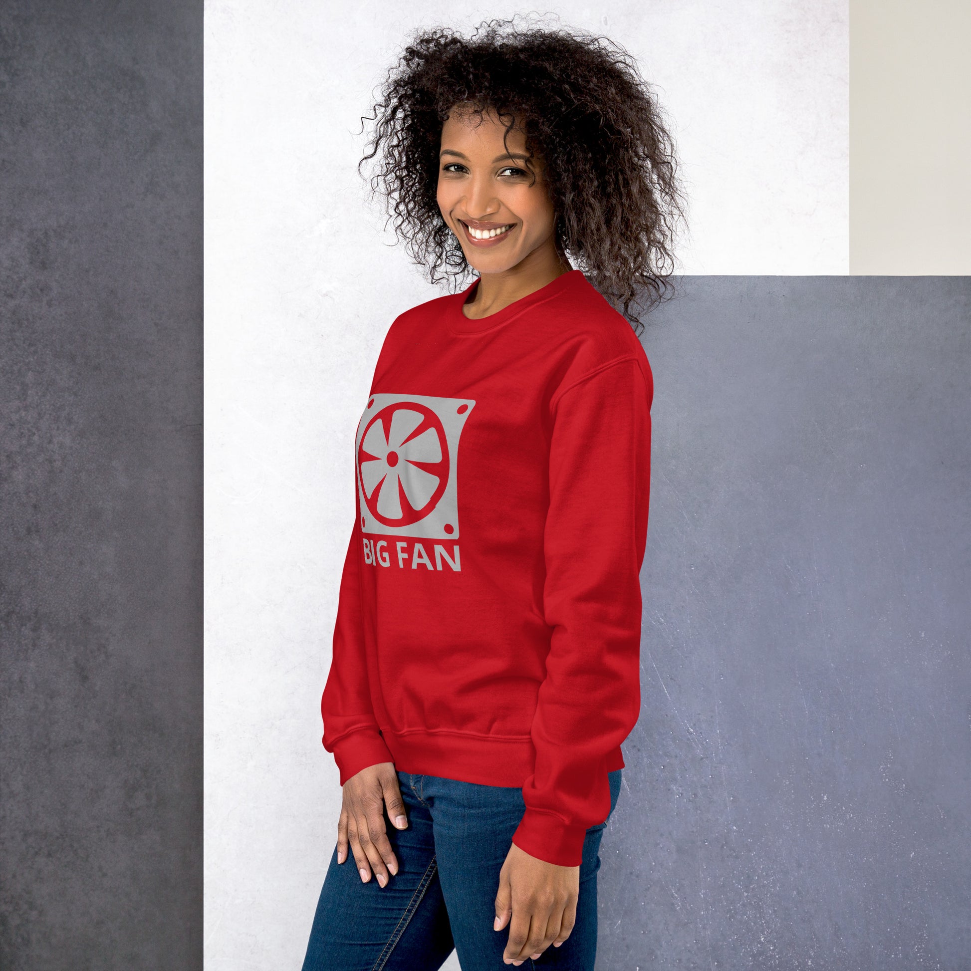 Women with red sweatshirt with image of a big computer fan and the text "BIG FAN"