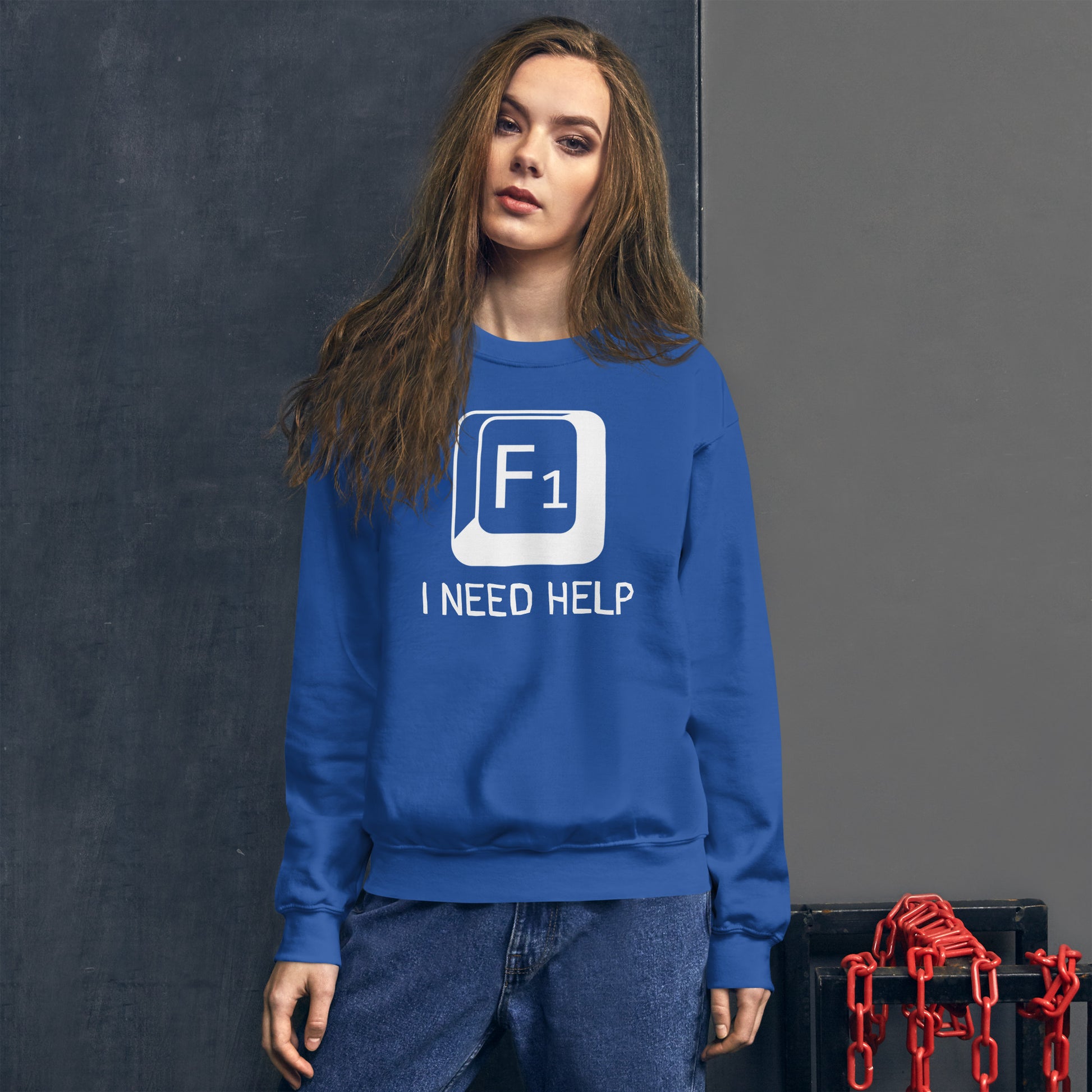 Women with royal blue sweatshirt and a picture of F1 key with text "I need help"