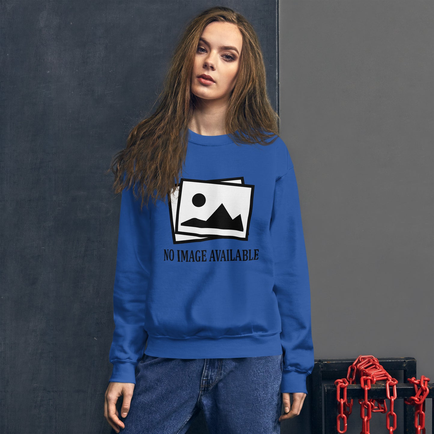Women with royal blue sweatshirt with image and text "no image available"
