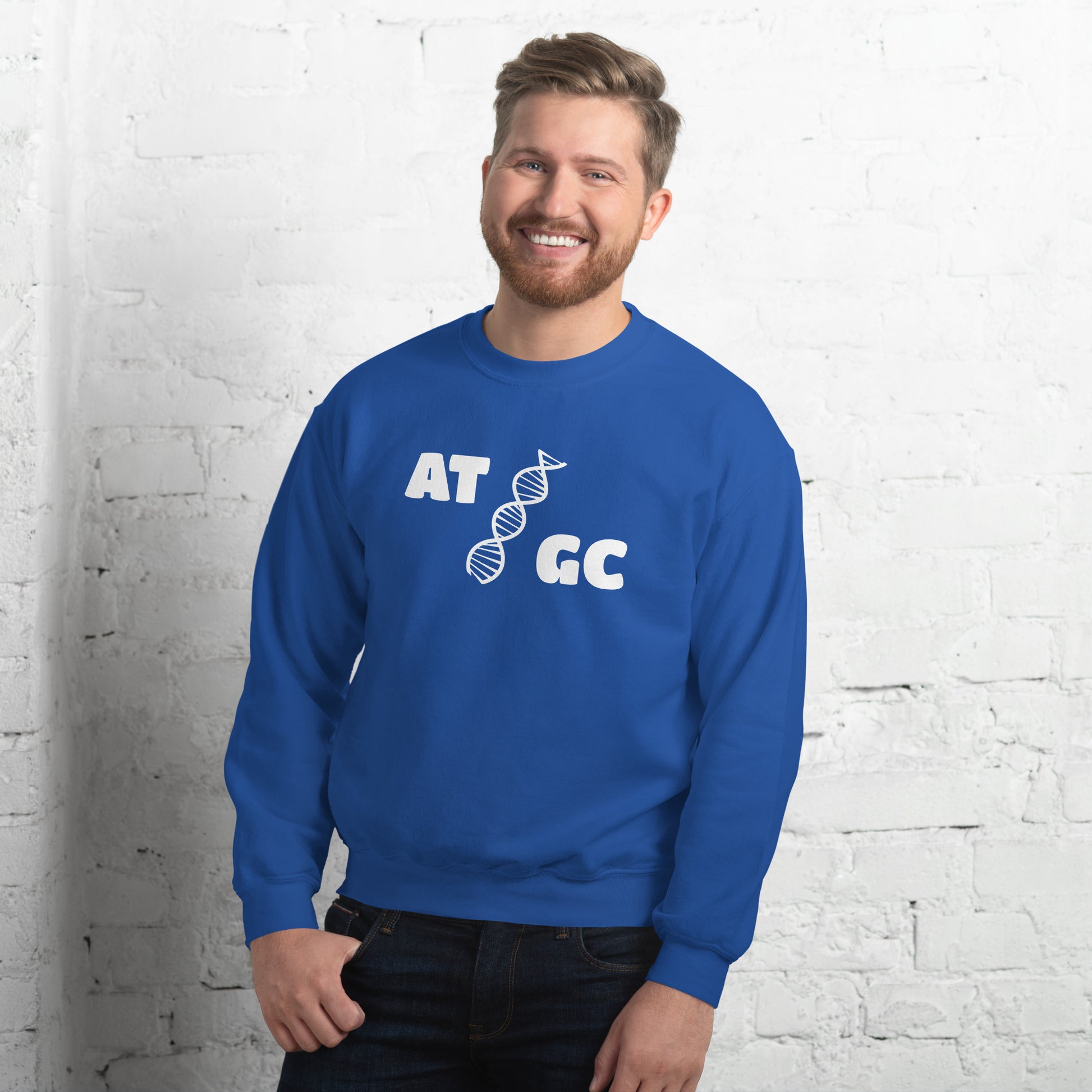 Men with royal blue sweatshirt with image of a DNA string and the text "ATGC"