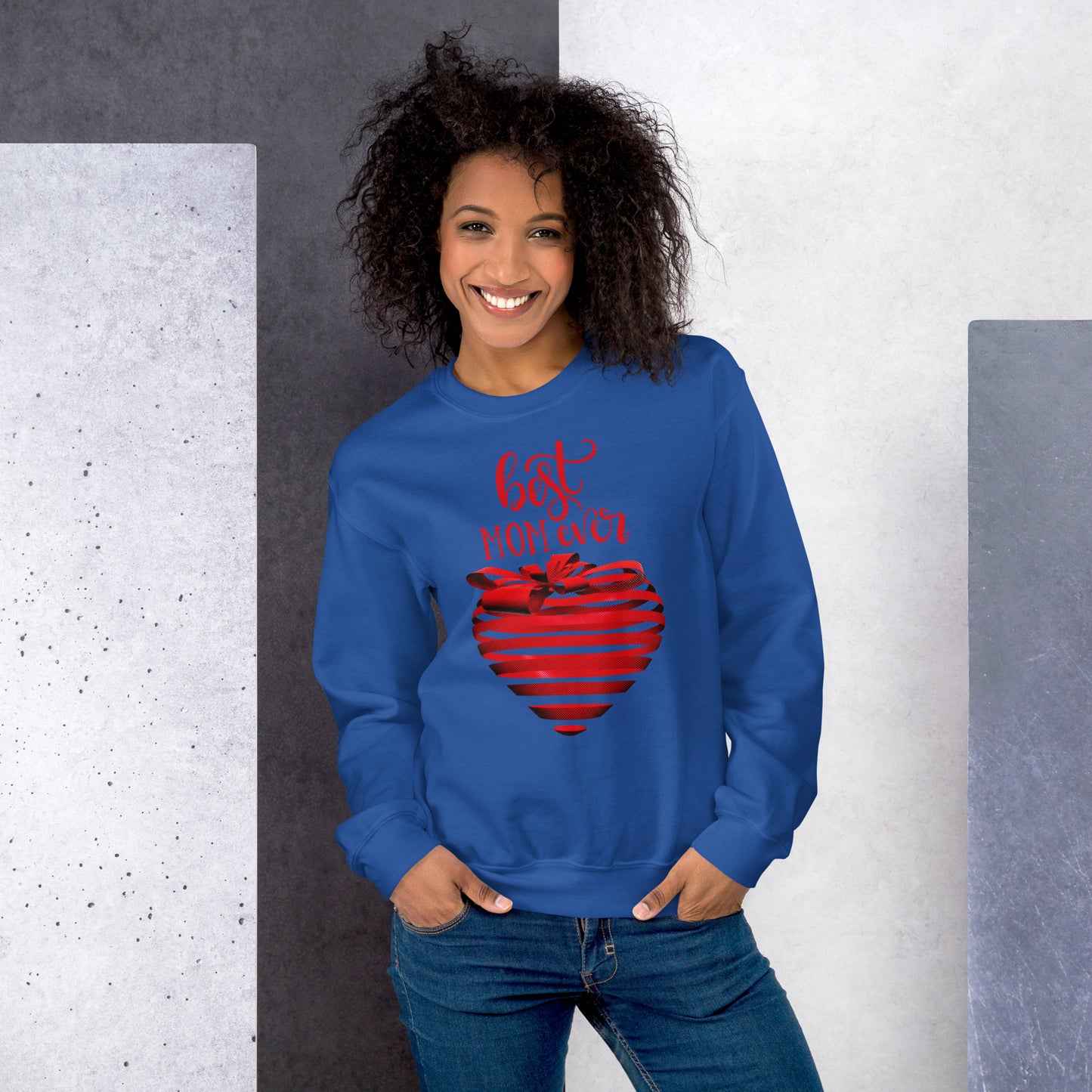 Women with royal blue sweater with red text best MOM Ever and red heart