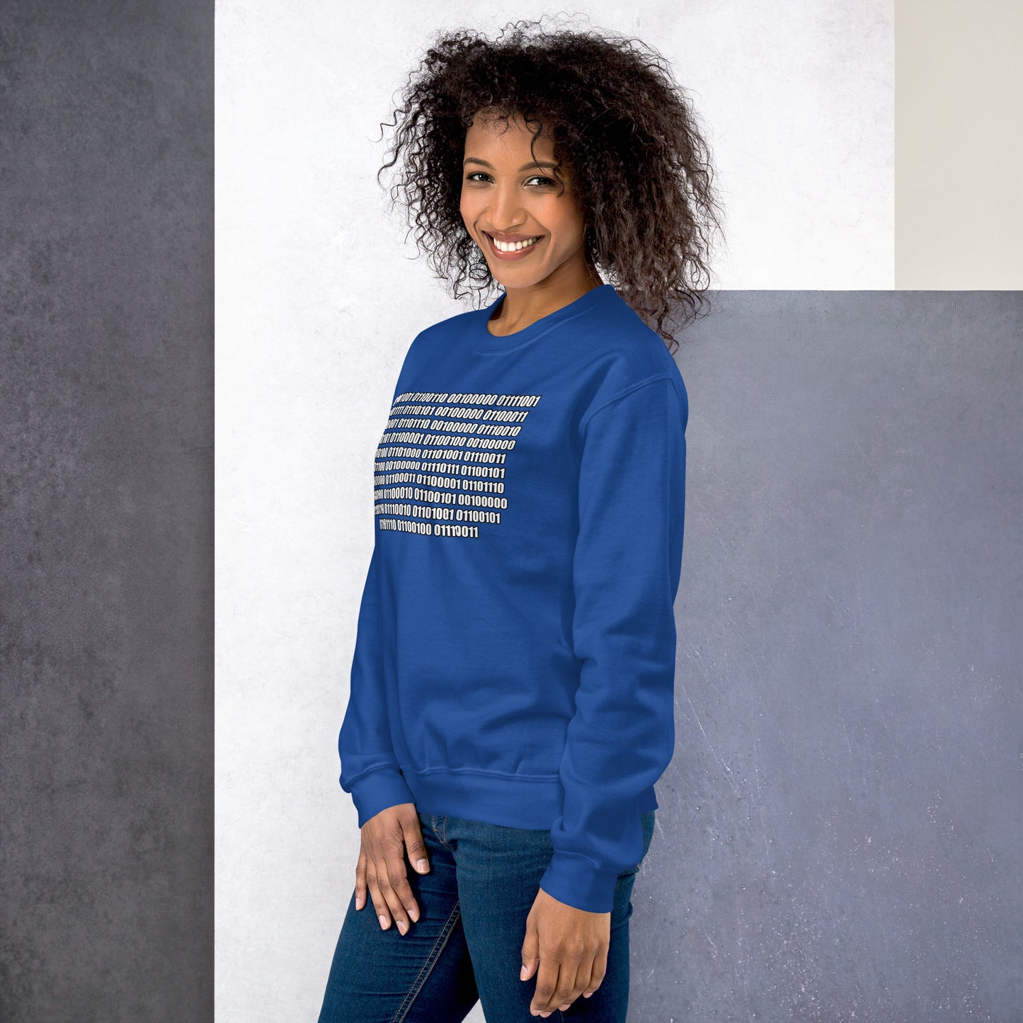 Women with royal blue sweatshirt with binaire text "If you can read this"