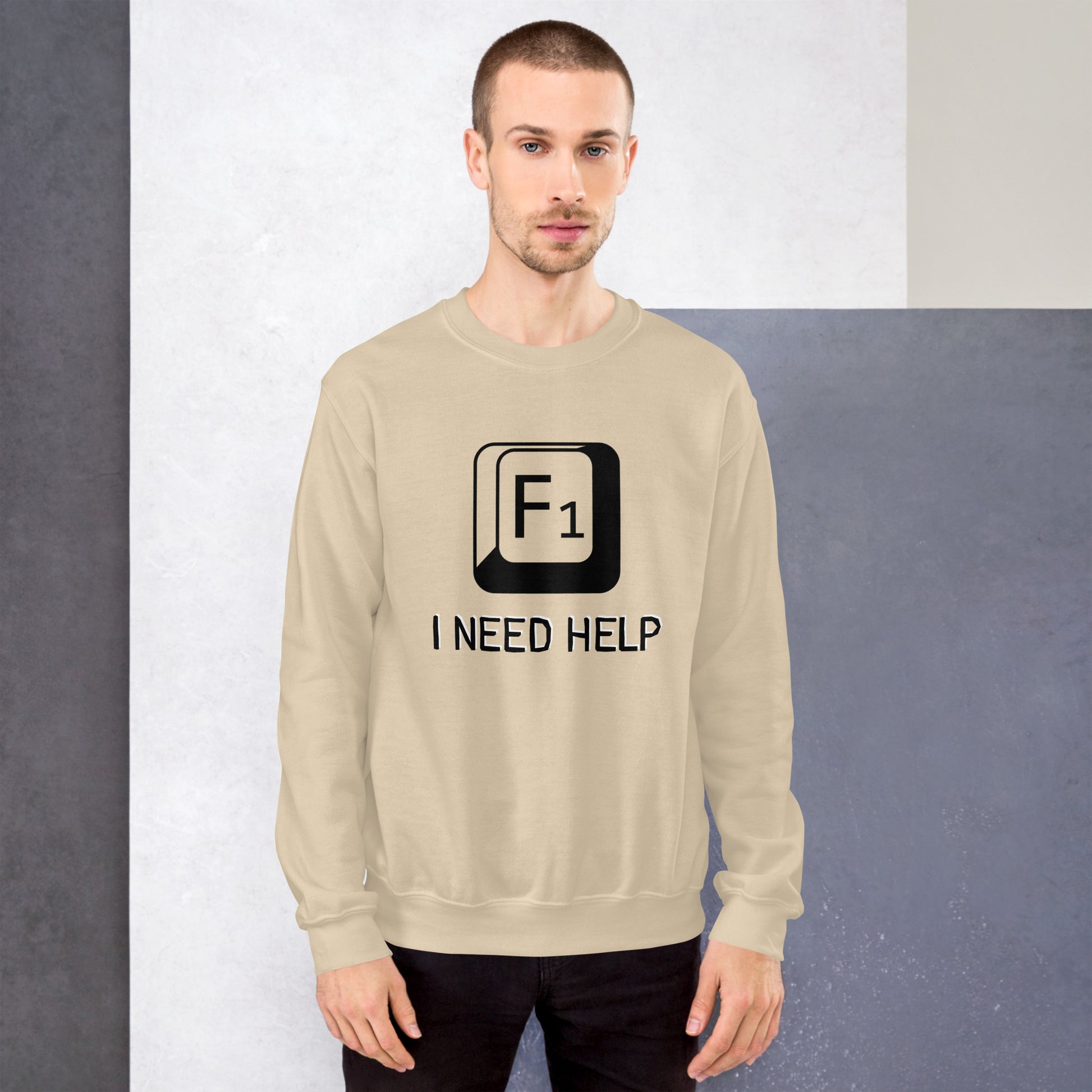 Men with sand sweatshirt and a picture of F1 key with text "I need help"