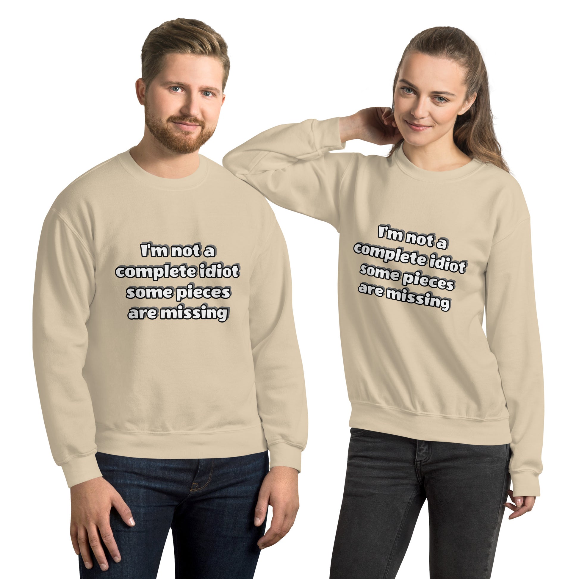 Man and women with sand sweatshirt with text “I’m not a complete idiot, some pieces are missing”