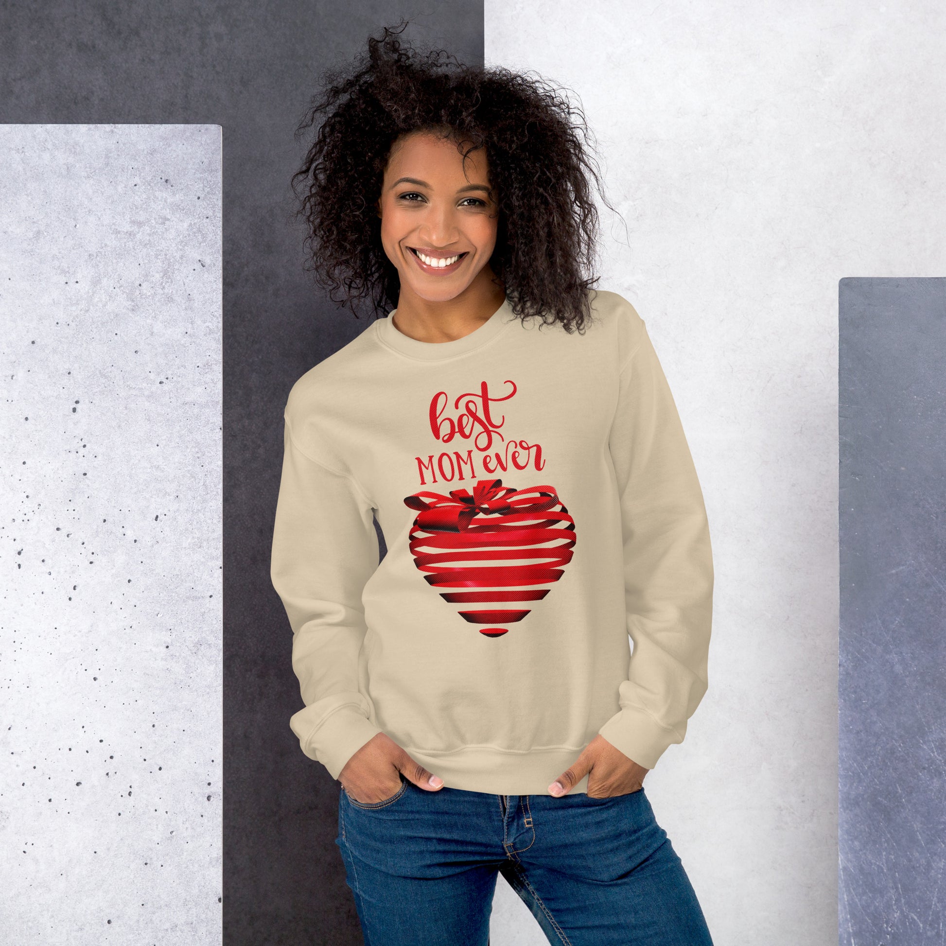 Women with sand sweater with red text best MOM Ever and red heart