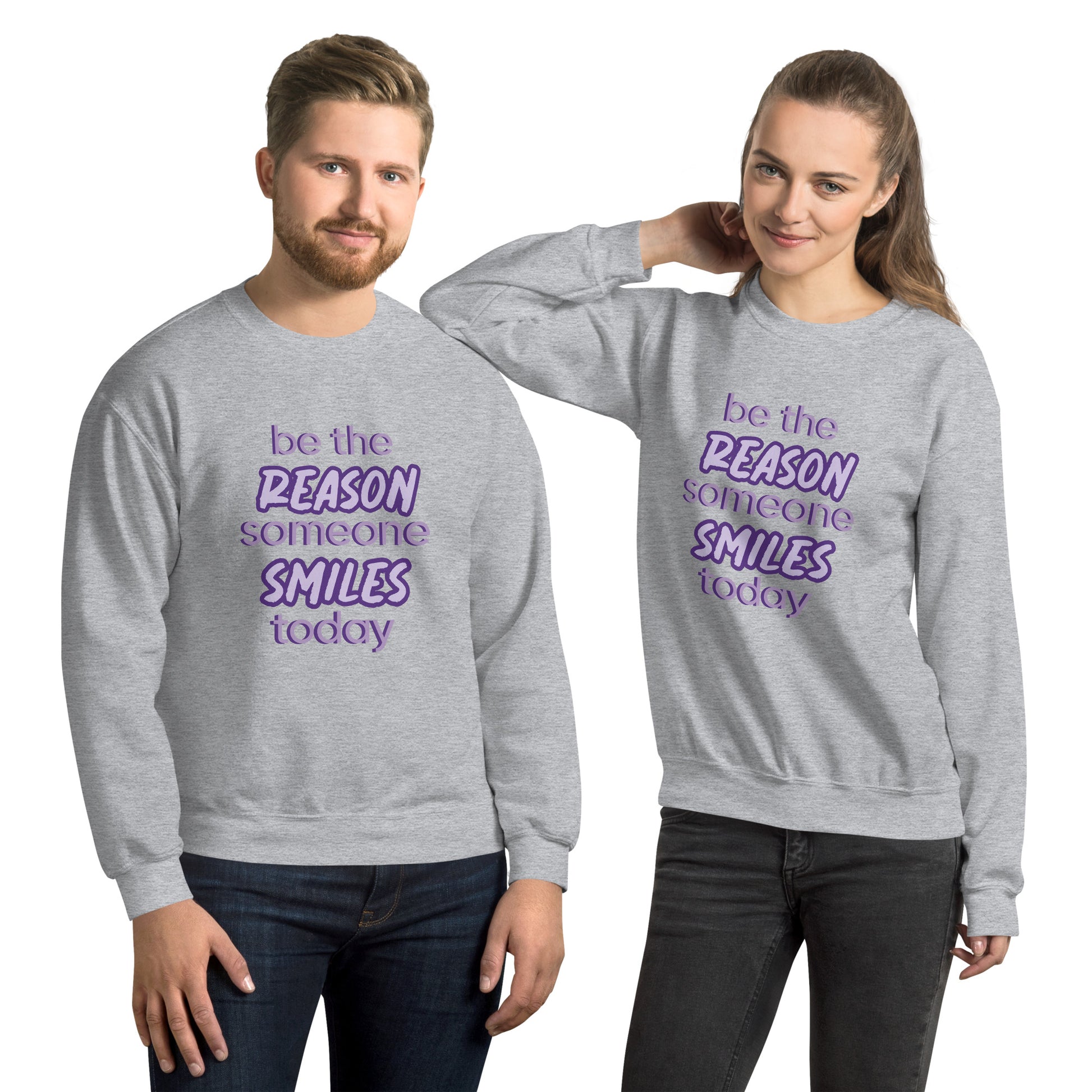Men and women with sport grey sweater and the quote "be the reason someone smiles today" in purple on it. 