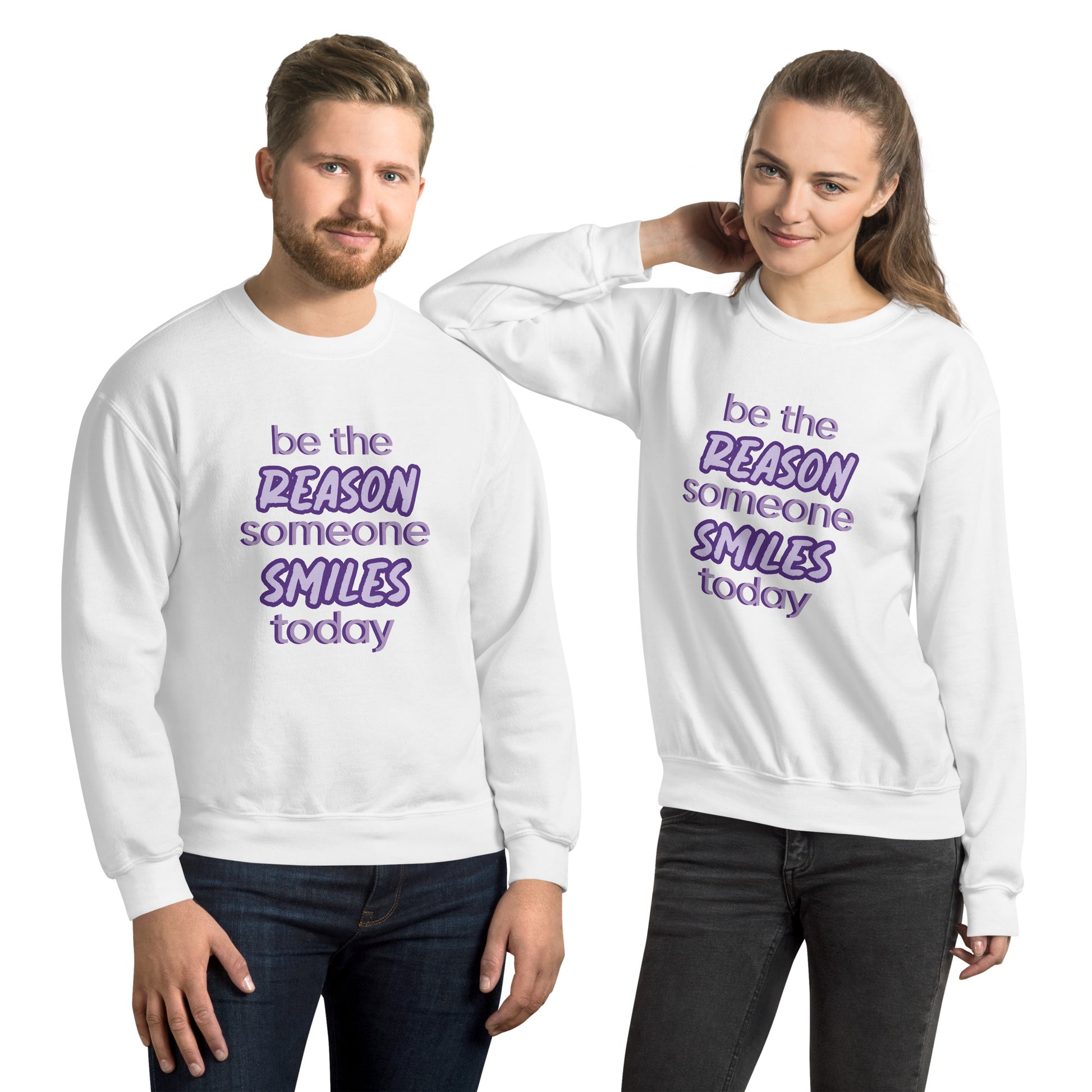 Men and women with white sweater and the quote "be the reason someone smiles today" in purple on it. 
