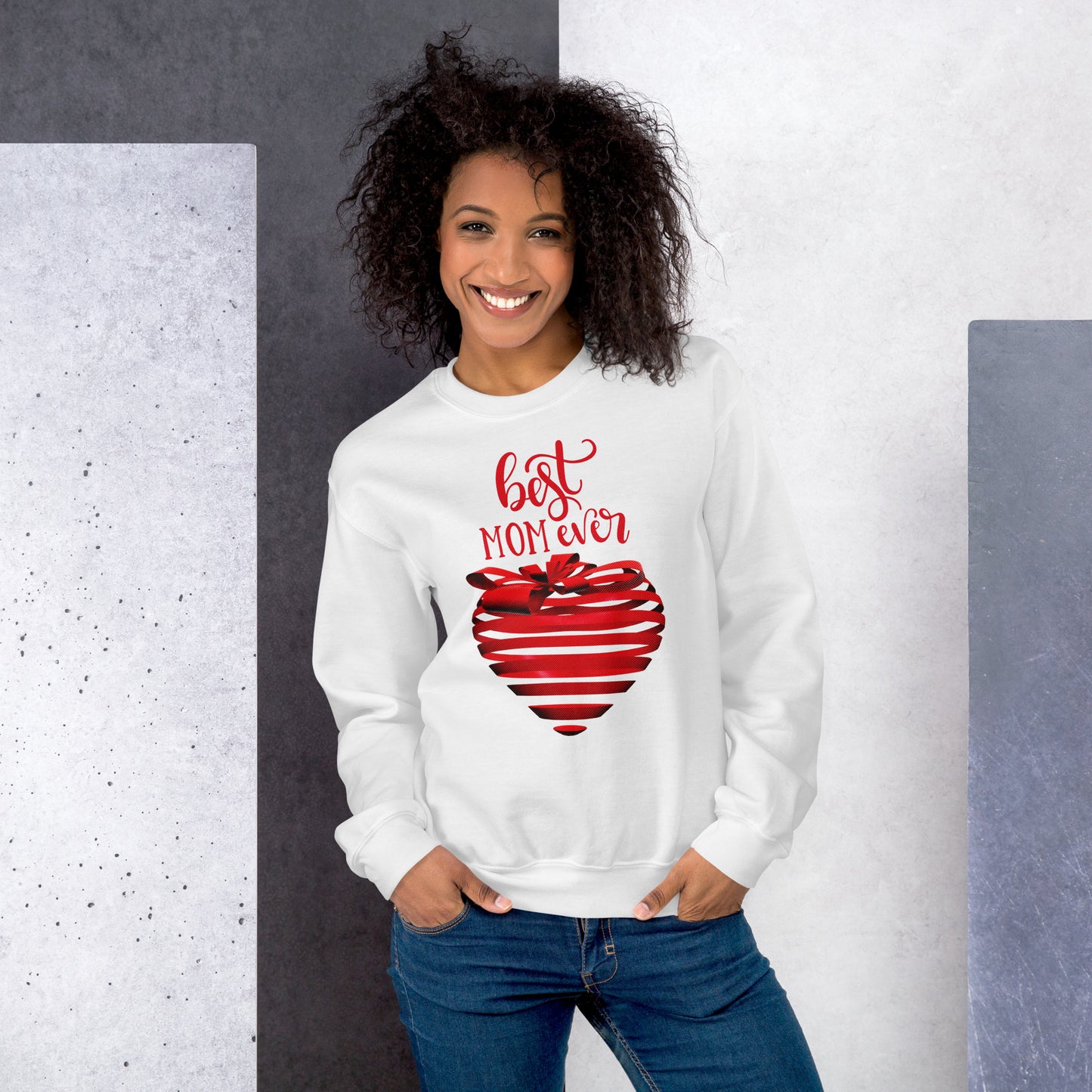 Women with white sweater with red text best MOM Ever and red heart