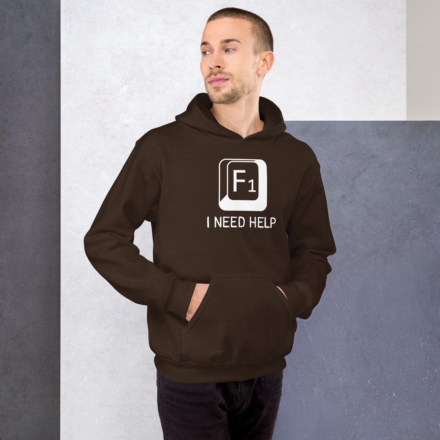 Men with dark chocolate hoodie and a picture of F1 key with text "I need help"