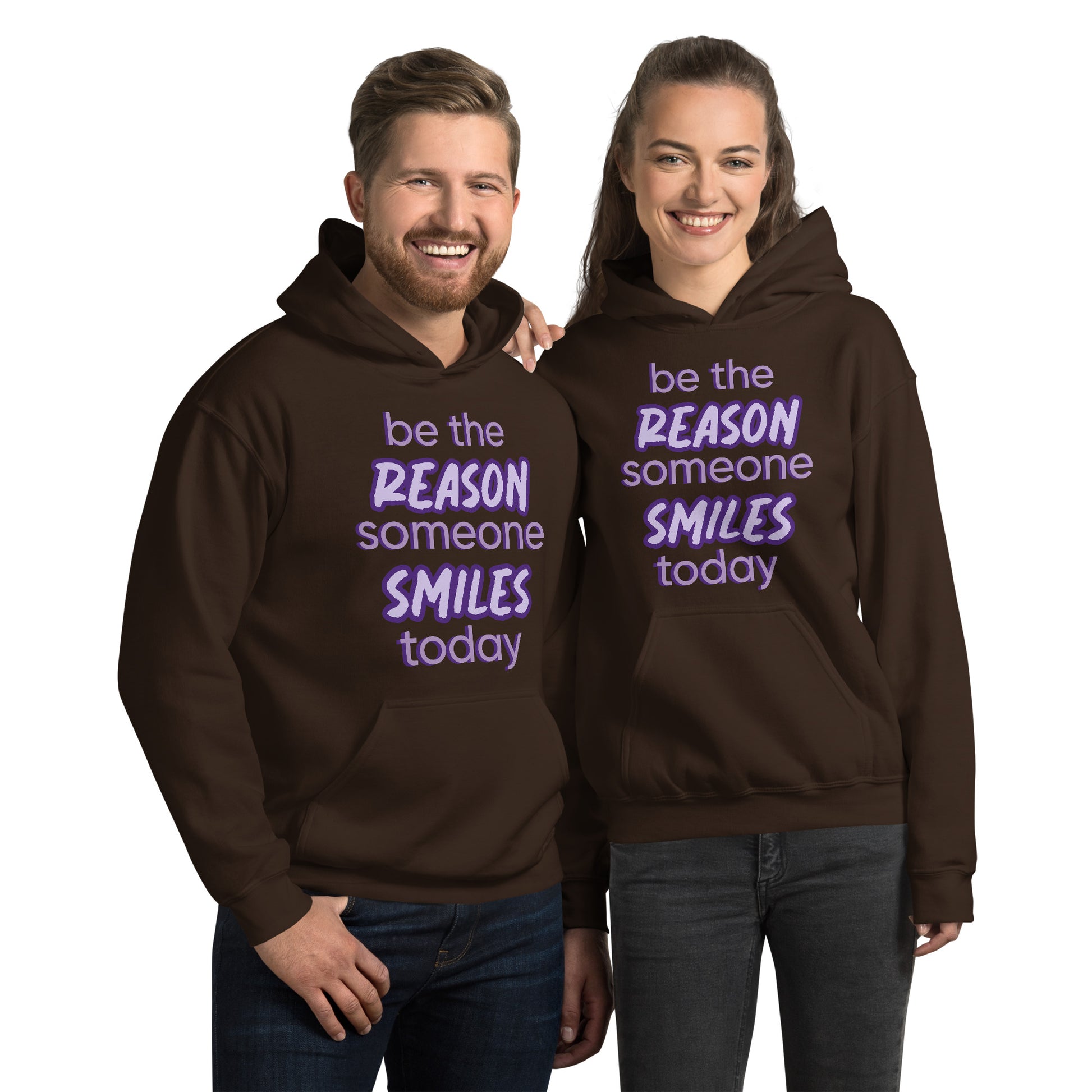 Men and women with dark chocolate hoodie and the quote "be the reason someone smiles today" in purple on it. 