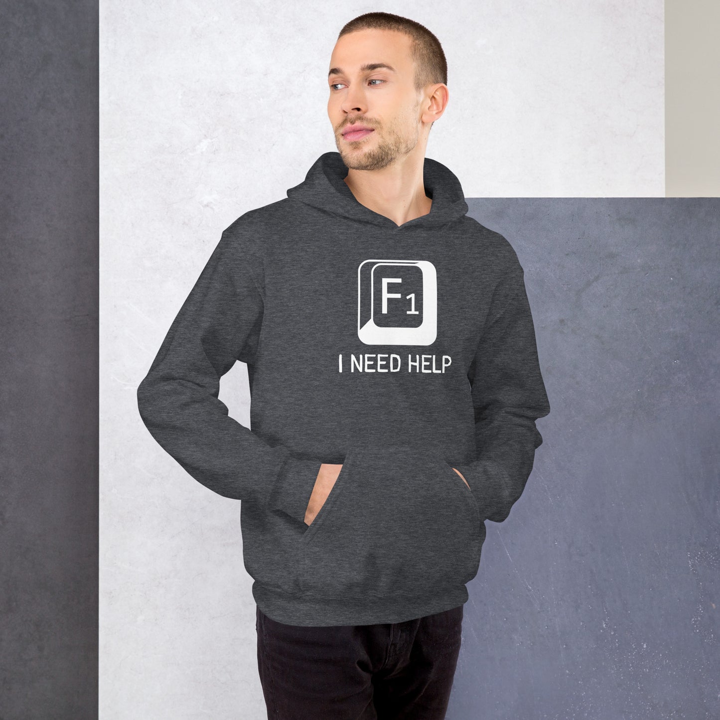 Men with dark heather hoodie and a picture of F1 key with text "I need help"