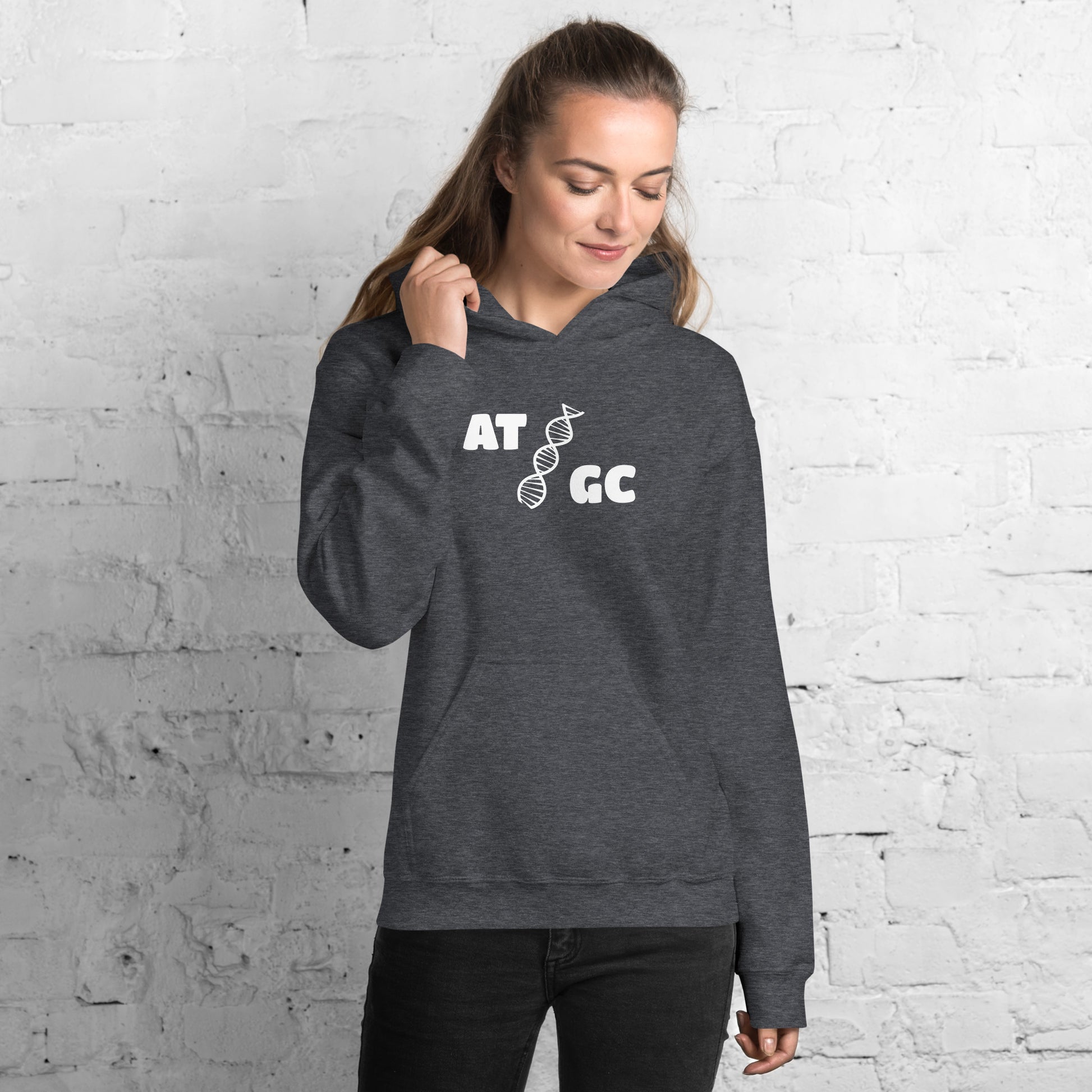 Women with dark grey hoodie with image of a DNA string and the text "ATGC"