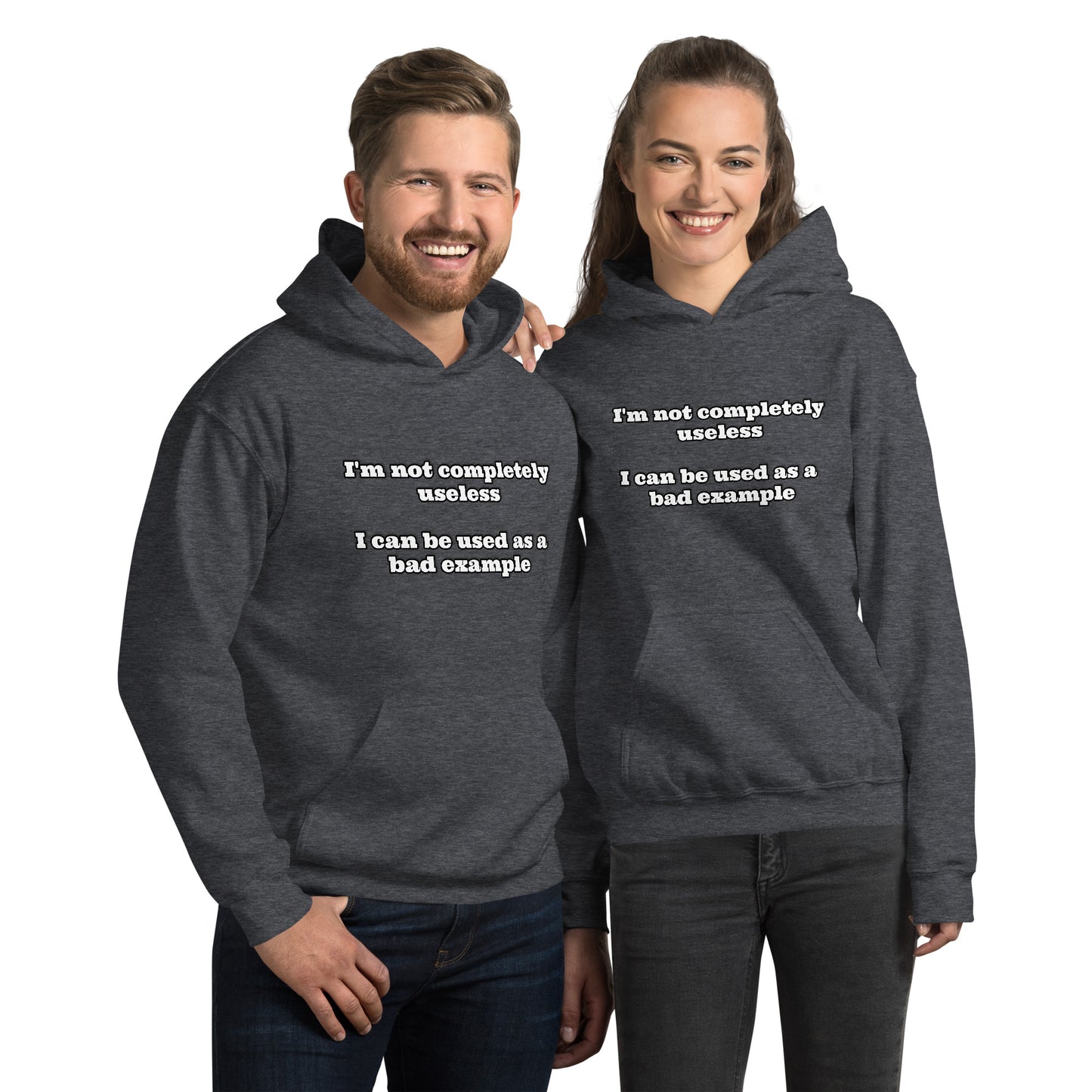 Man and women with dark grey hoodie with text “I'm not completely useless I can be used as a bad example”