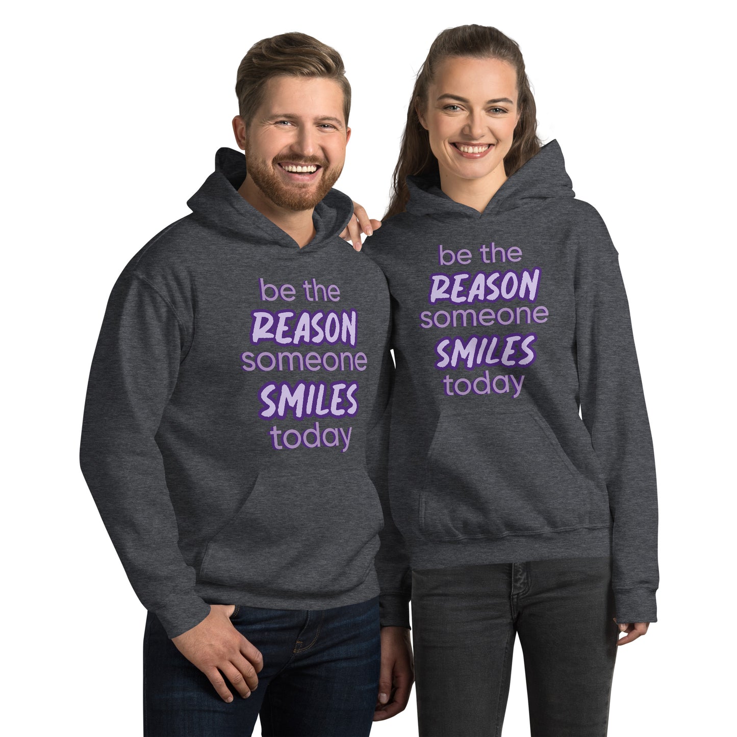 Men and women with dark grey hoodie and the quote "be the reason someone smiles today" in purple on it. 