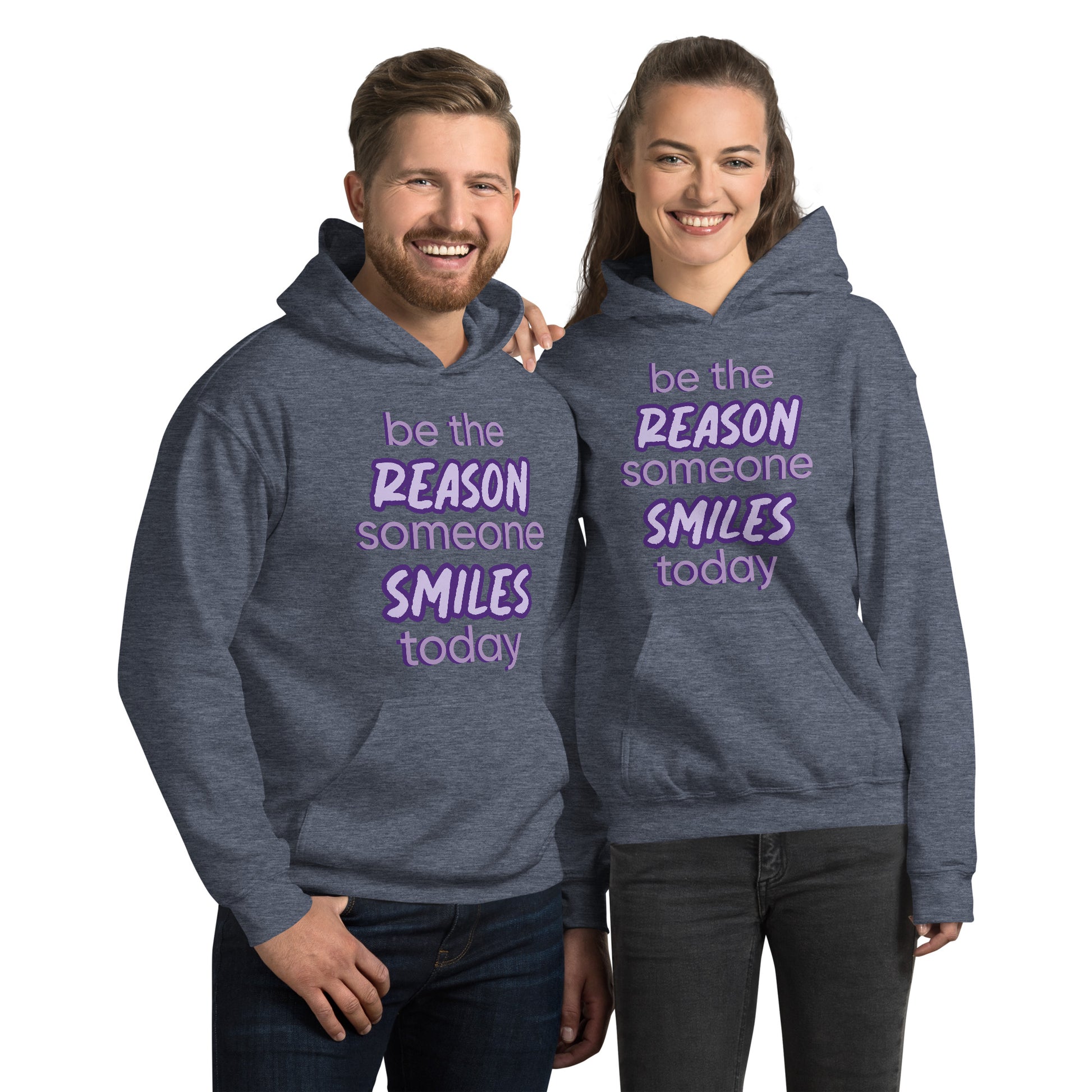 Men and women with sport dark navy hoodie and the quote "be the reason someone smiles today" in purple on it. 