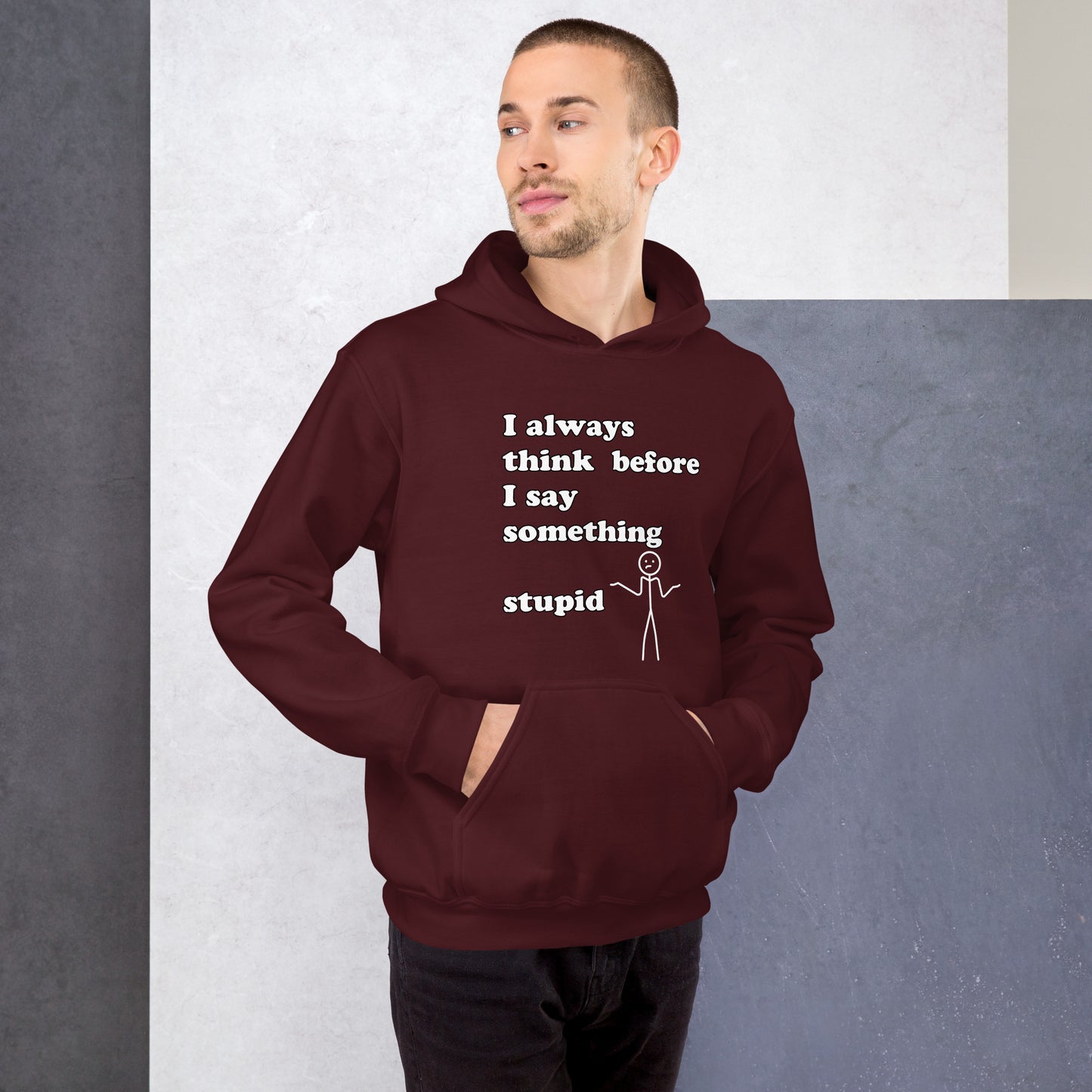 Man with maroon hoodie with text "I always think before I say something stupid"
