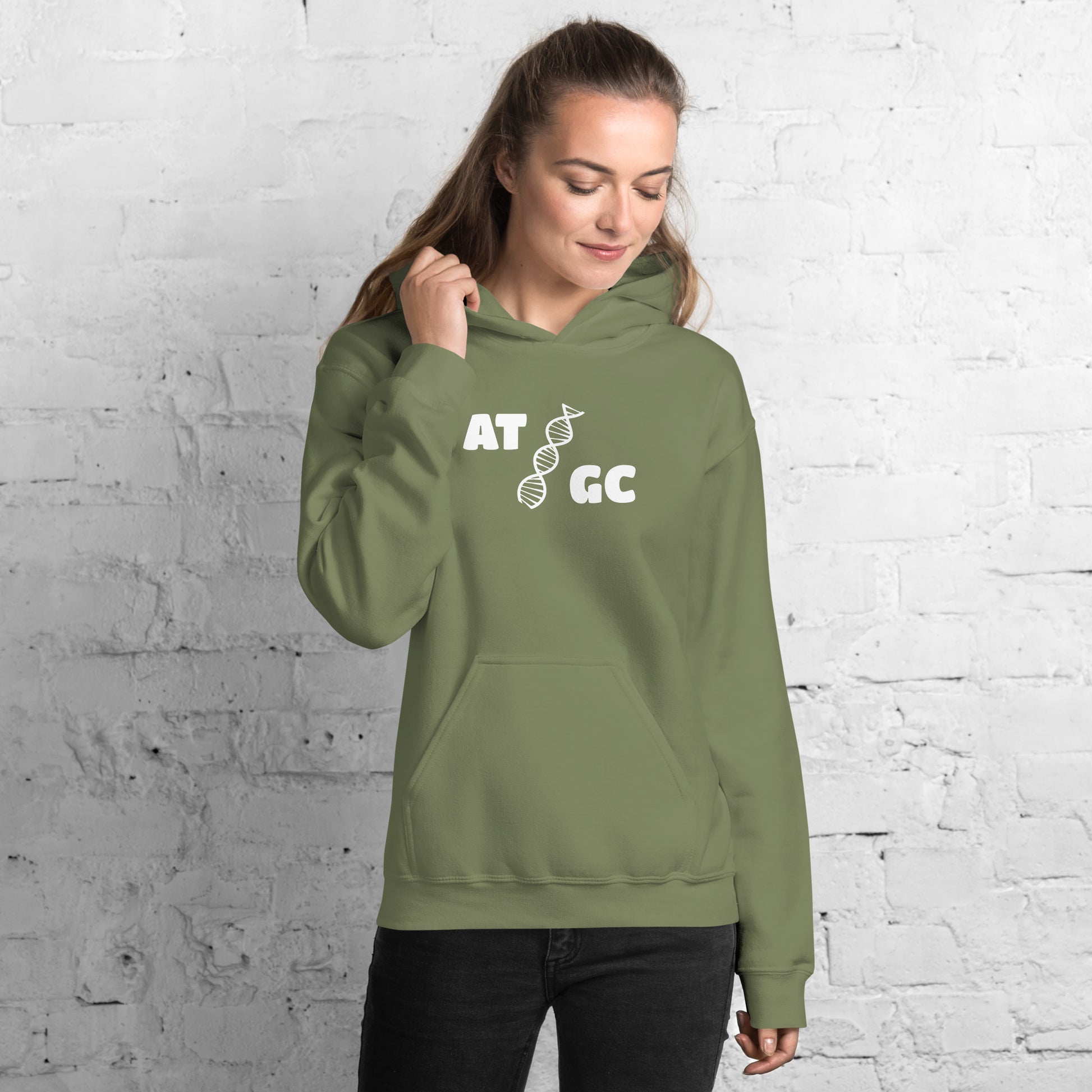 Women with military green hoodie with image of a DNA string and the text "ATGC"