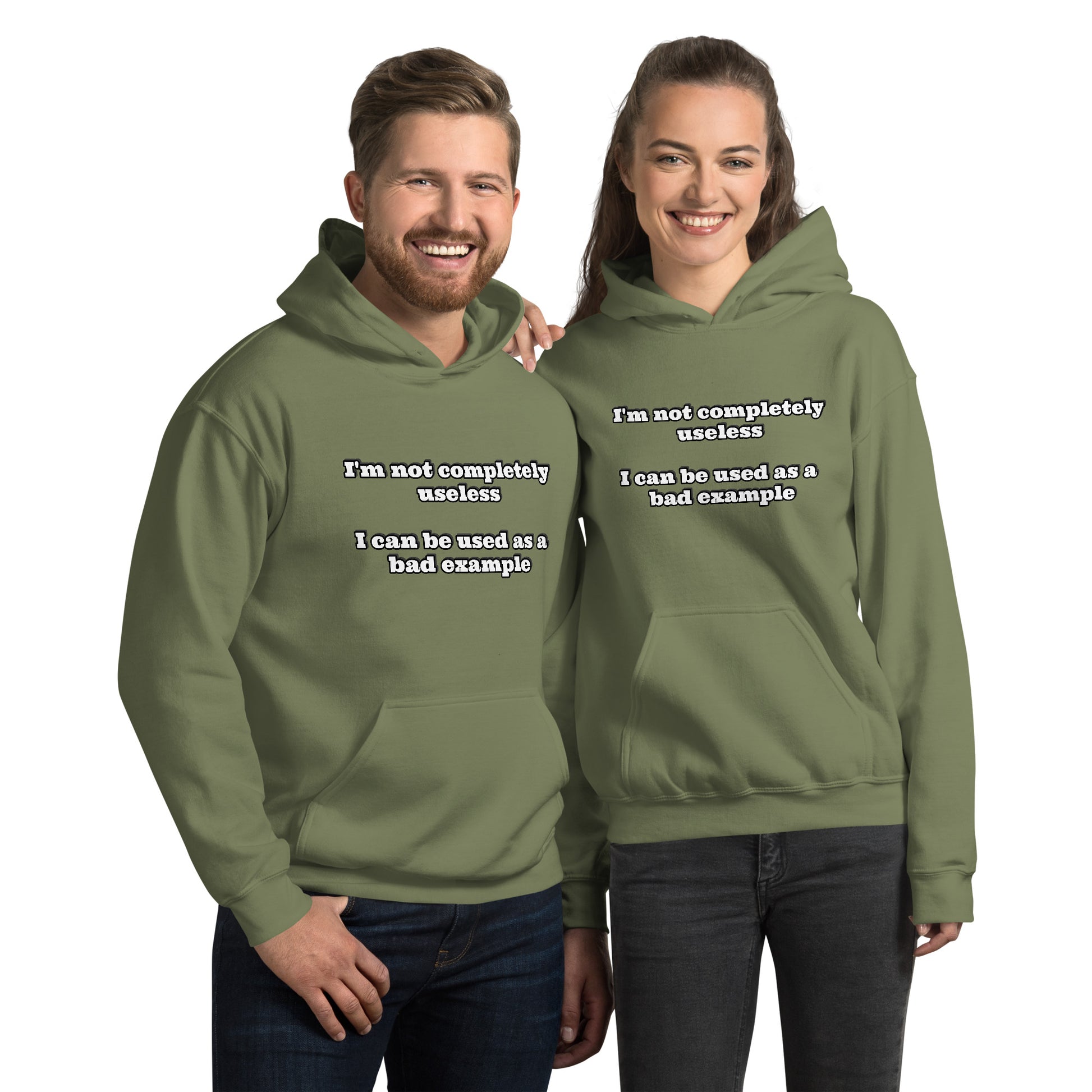Man and women with military green hoodie with text “I'm not completely useless I can be used as a bad example”