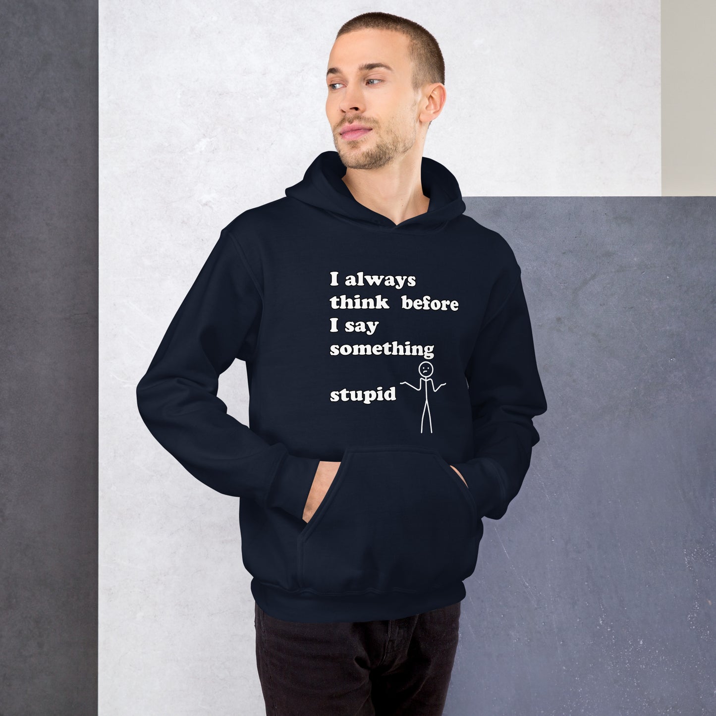 Man with navy blue hoodie with text "I always think before I say something stupid"