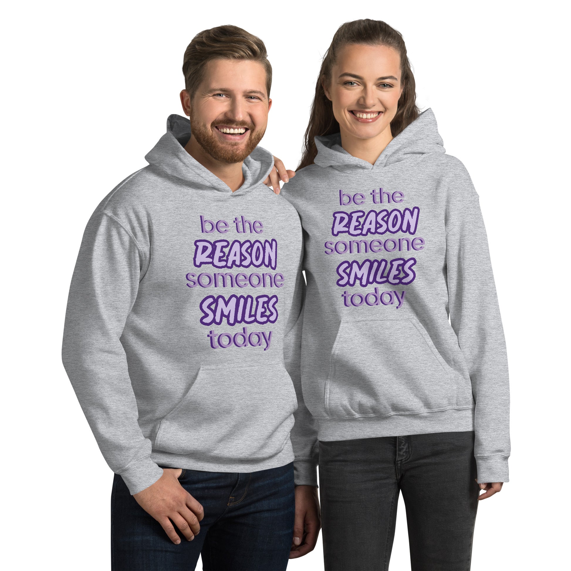 Men and women with sport grey hoodie and the quote "be the reason someone smiles today" in purple on it. 