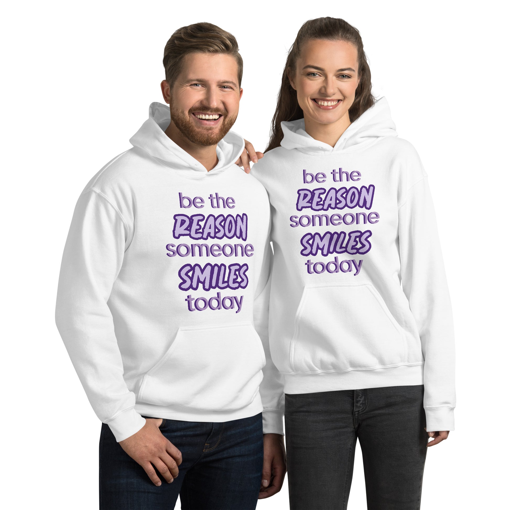 Men and women with white hoodie and the quote "be the reason someone smiles today" in purple on it. 