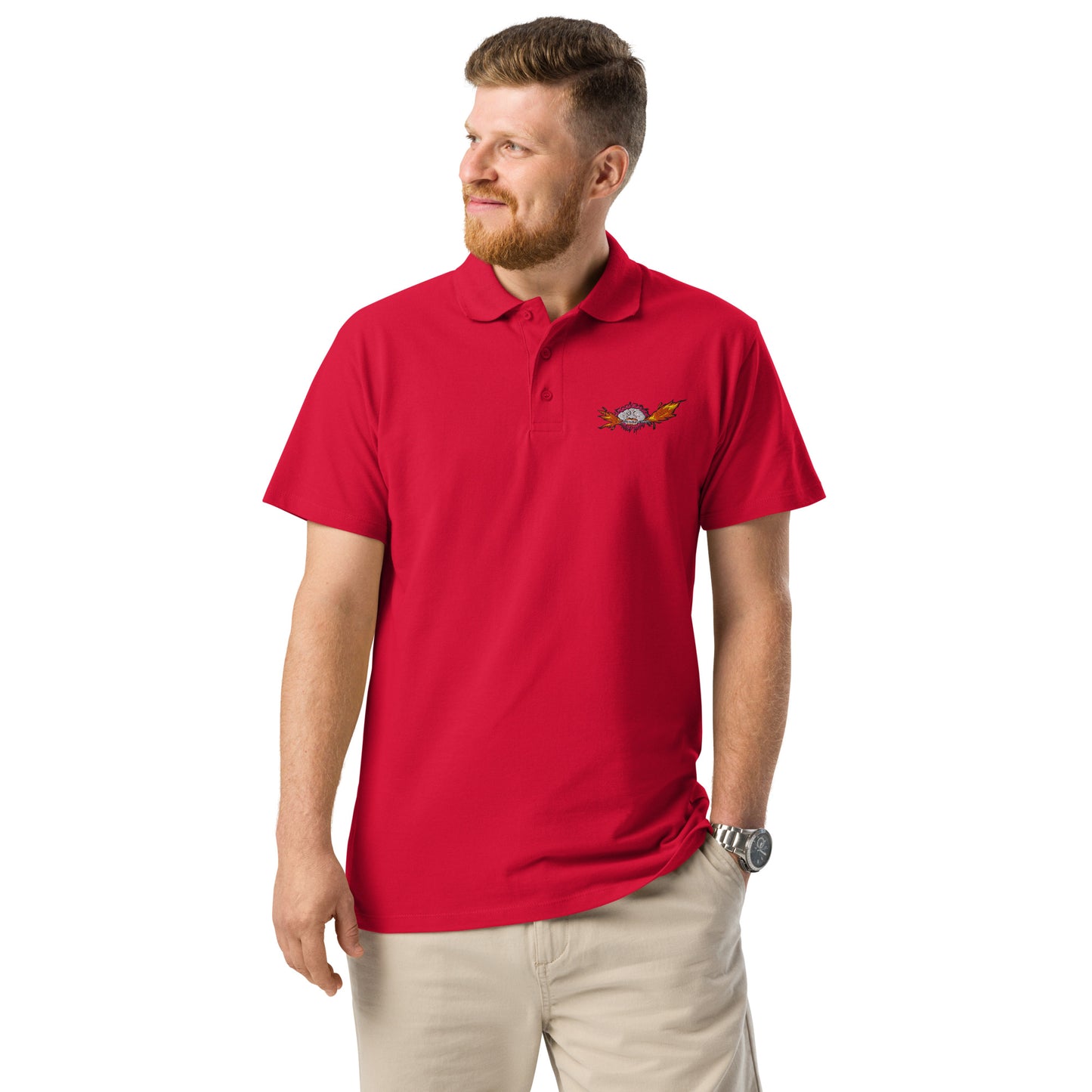 man with Red polo with mad max logo
