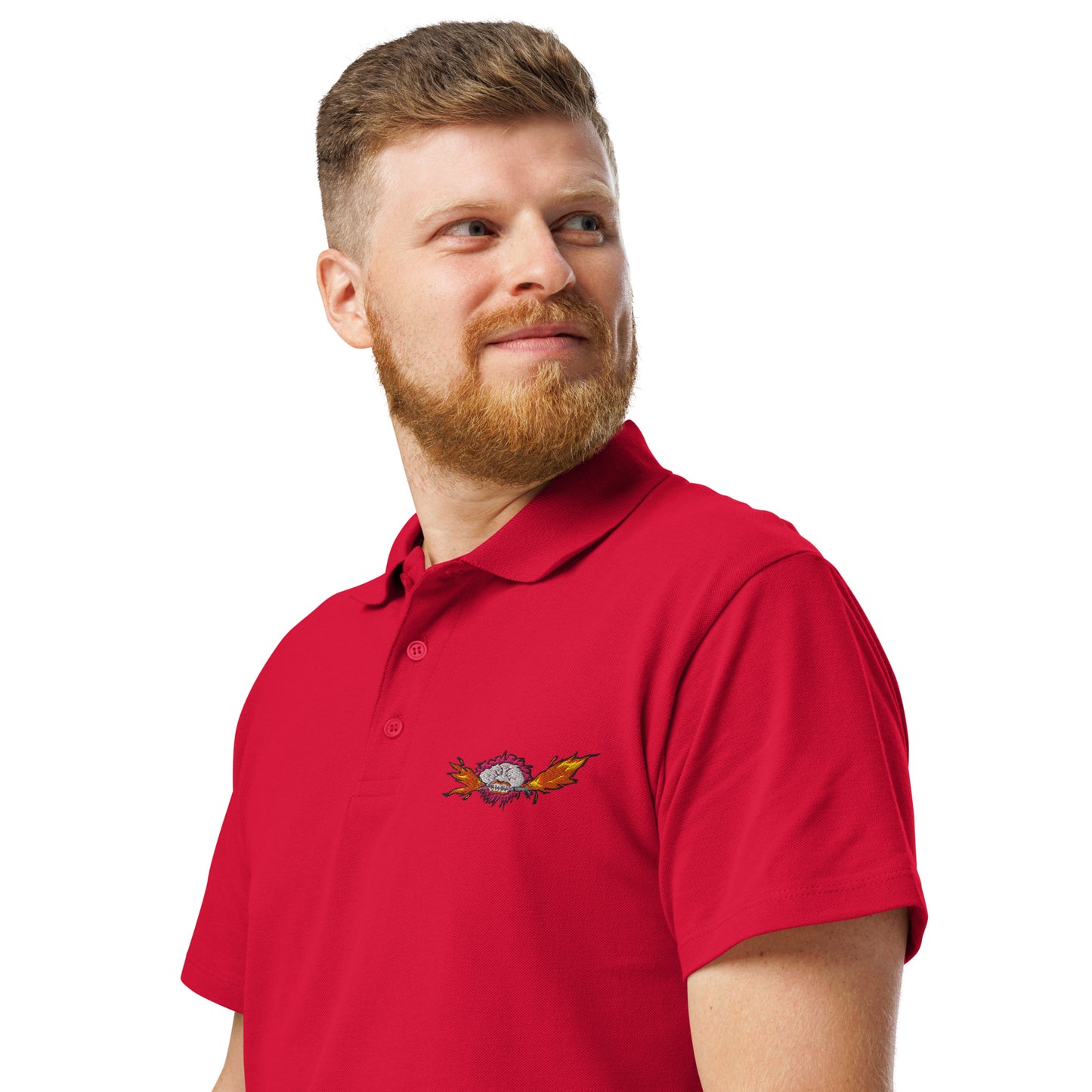 man with Red polo with mad max logo