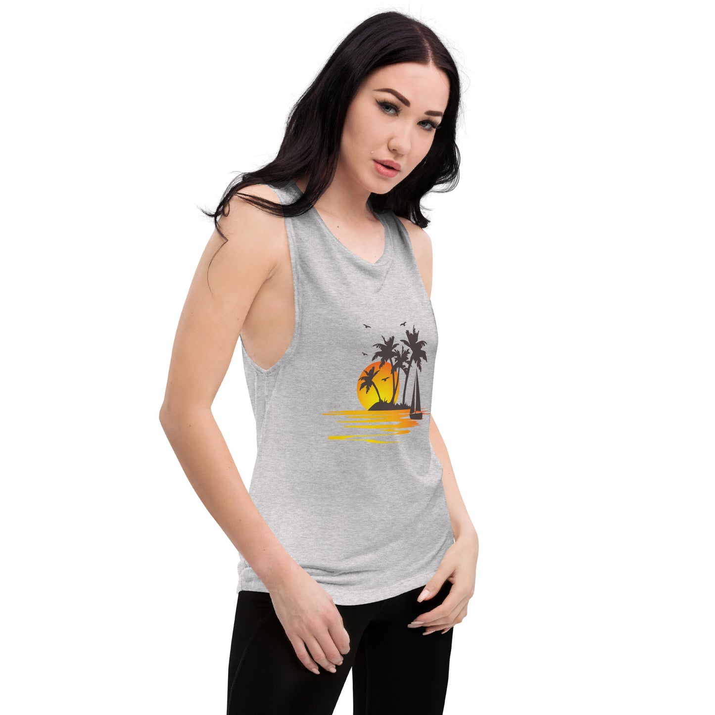 Women with athletic muscle tank with a picture of sunset, palm trees and sailboat