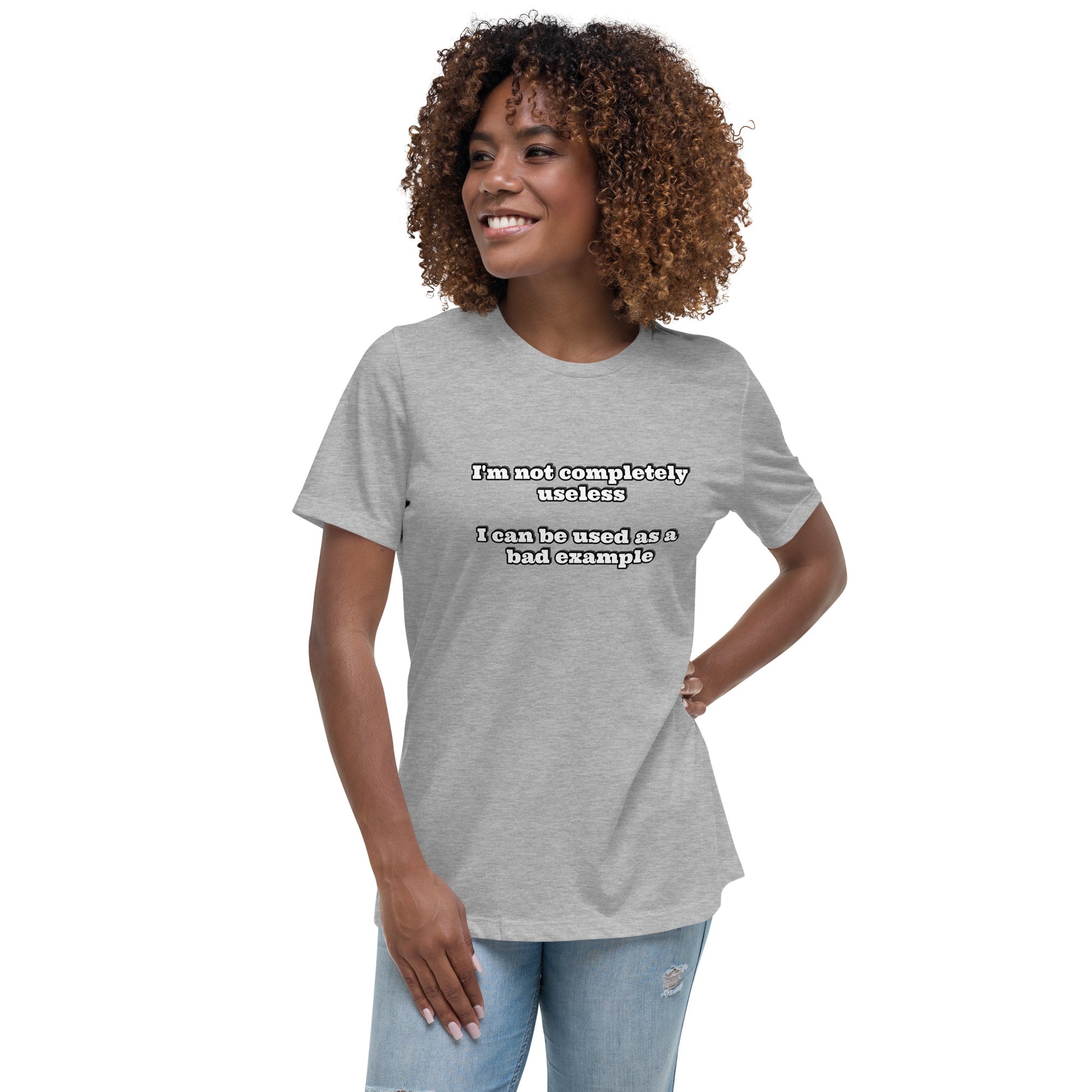 Women with grey t-shirt with text “I'm not completely useless I can be used as a bad example”