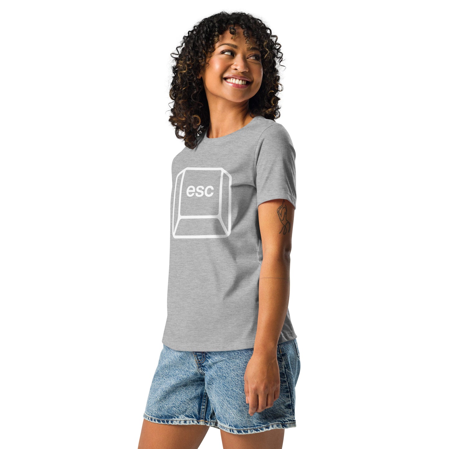 Woman with grey t-shirt with picture of esc key