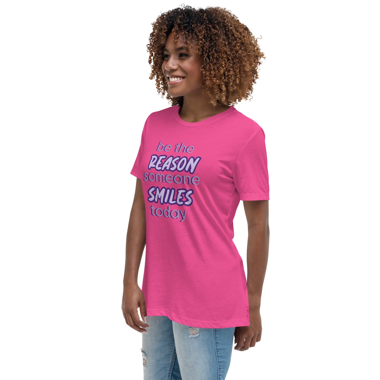 Woman with berry T-shirt and the quote "be the reason someone smiles today" in purple on it.
