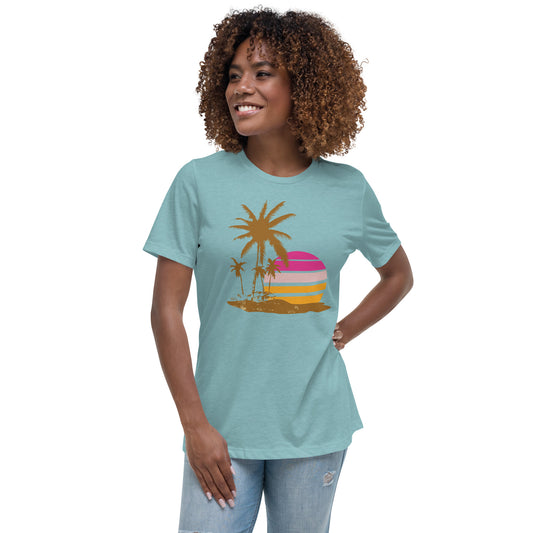 Woman with blue lagoon T-shirt and a picture of brown palm trees and a pink sunset