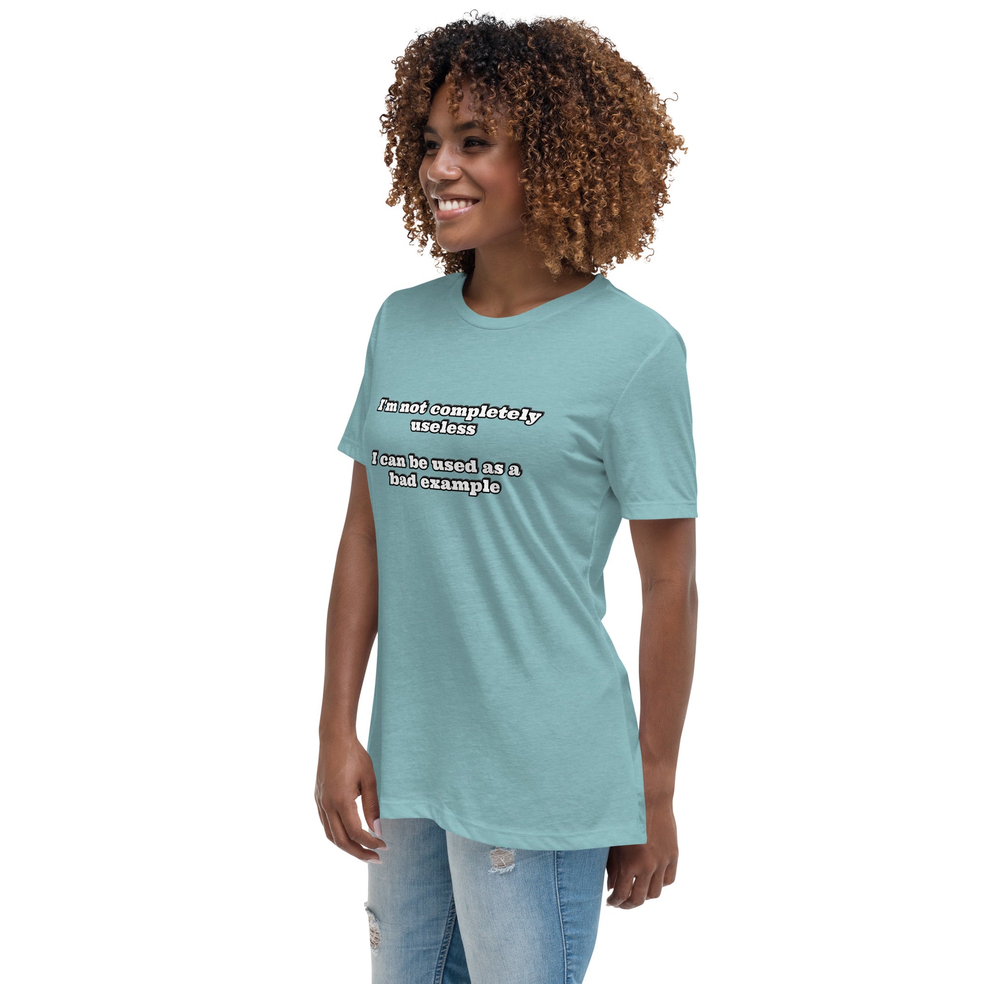 Women with blue lagoon t-shirt with text “I'm not completely useless I can be used as a bad example”