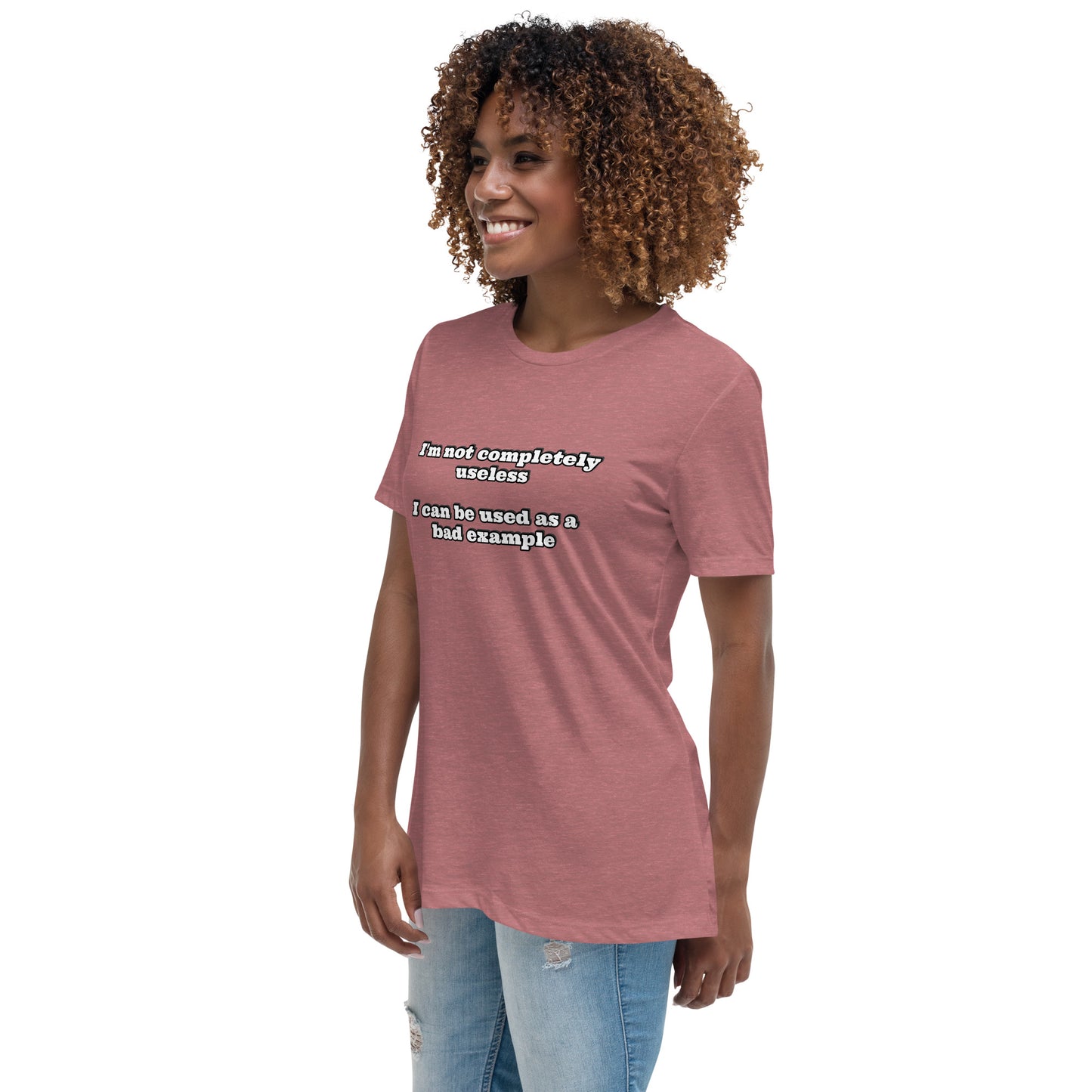 Women with mauve t-shirt with text “I'm not completely useless I can be used as a bad example”